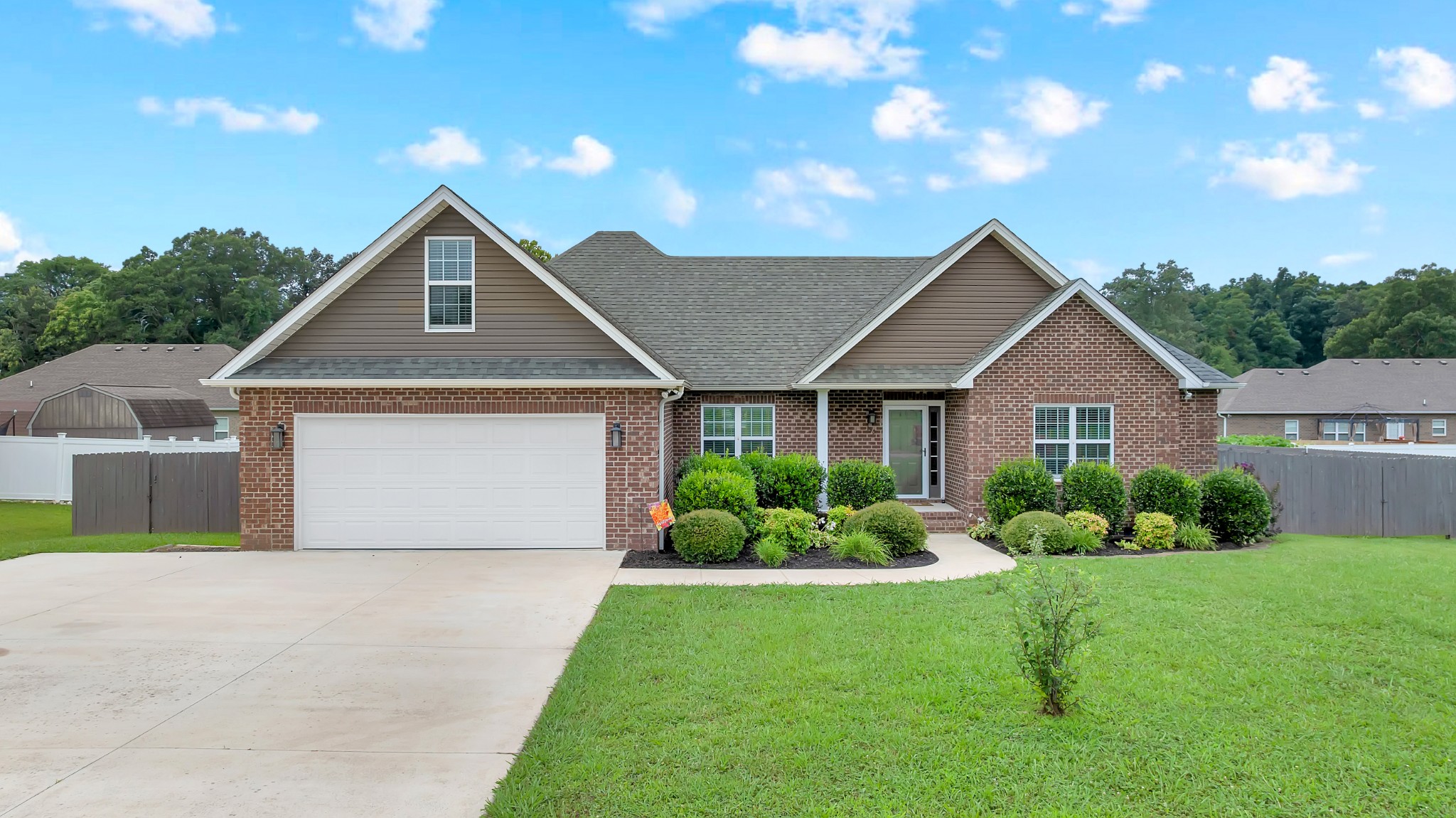 This beautiful 3-bedroom, 2 bath all brick home was designed with comfort, style, and everyday living in mind. From the moment you step inside, you'll love the inviting open-concept floorplan that creates the perfect space for gathering with family and friends. The thoughtfully designed split-bedroom layout offers added privacy, with the spacious primary suite tucked away from the secondary bedrooms. Gorgeous hardwood floors add warmth and timeless charm throughout the main living areas. The large bonus room offers endless possibilities. Step outside and discover your own backyard retreat! Enjoy relaxing mornings or entertaining guests on the large covered back porch, then cool off on warm summer days in the above-ground pool. Whether you're hosting a cookout or simply unwinding after a long day, this outdoor space is made for making memories. If you've been searching for a low -maintenance, move-in ready home with a functional layout and fantastic outdoor living, this one checks all the boxes.