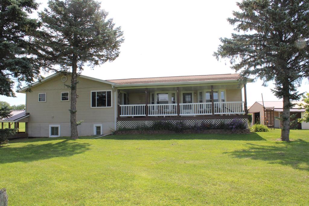 Welcome to Lake View Farm! Located in Ogemaw County just outside of the town of Lupton, this 4 bed 3 1/2 bath home features covered front and back porches, Generac generator, outdoor wood boiler, lake frontage on Bass Lake and shared lake access to Rifle Lake across the street. The basement is currently being used as a rental apartment with full kitchen and bath with private covered access. The majority of 23 +/- acres are currently in income producing hay. One outbuilding is set up as a workshop. Other outbuildings are a detached garage, storage shed and pole barn. The pole barn is set up for storage and has large covered areas on two sides. One side has a livestock stall with fenced pasture area in the back. Whether you are looking to start a hobby farm or simply quiet country living the choice is yours!  Dial the Listing Agent directly for more information, the ''Contact Agent'' button will not take you there.