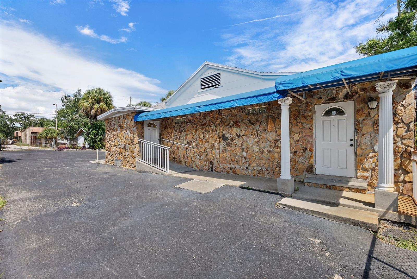 This prime commercial opportunity offers a flexible, once operational hair salon facility situated on 22nd Avenue South in the Childs Park/Revitalization district of St. Petersburg, FL. The main building houses a full salon layout with plumbing, wiring, HVAC, and interior finishes largely intact from its last use. A secondary outbuilding on the site includes a restroom, making it ideal for a workshop, back office, storage or ancillary use. Onsite parking supports customer traffic and staff. The site includes frontage and excellent visibility on 22nd Ave S, a key corridor in the area. There is also visibility from 34th St South. Salon equipment is negotiable- chairs, stations, dryers, etc. Building is vacant and ready for immediate occupancy well suited for salon, spa, boutique, wellness center, creative studio, light retail, training center and was once used as a veterinarian office. Over 200,000 households within a 5 mile radius in an area located in a district targeted for revitalization and commercial uplift.