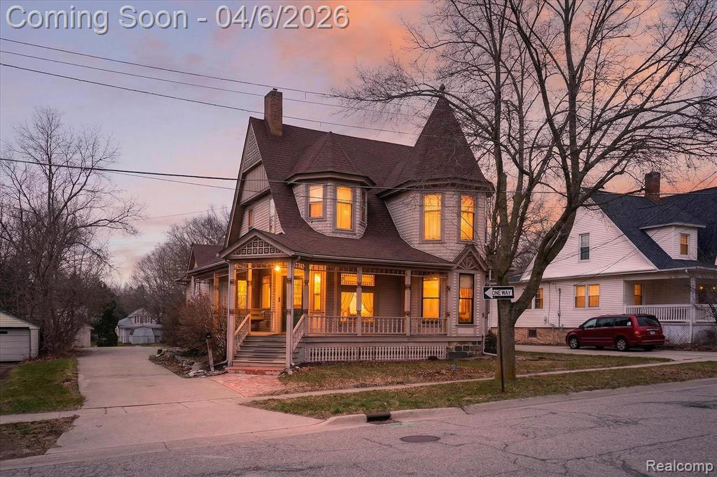 Step into timeless charm with this beautifully maintained Victorian home featuring 3 bedrooms and 2.5 baths. From the moment you enter, you’ll be welcomed by a stunning foyer showcasing exquisite original woodwork and craftsmanship throughout. Gorgeous hardwood floors, original doors, and antique hardware add authentic character you simply can’t replicate.The home offers elegant living spaces, including classic parlor doors and a warm, inviting layout perfect for both everyday living and entertaining. The renovated kitchen features granite countertops and heated flooring with modern updates while preserving the home’s historic appeal.Upstairs, the spacious primary bath includes a relaxing garden tub. A bright four-seasons room with its own mini-split heat provides the perfect space to enjoy in any weather. Outside, enjoy a large welcoming porch, ideal for morning coffee or evening relaxation. The property also includes a 2-car heated/central air garage for added convenience. This is a rare opportunity to own a Victorian home that seamlessly blends original character with thoughtful updates.