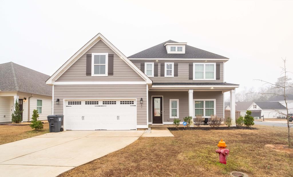 Experience refined living in this exceptional 4-bedroom, 3.5-bath residence, featuring a large loft area, offering 3,172 sq ft of thoughtfully curated space. Just 3.5 years young and truly better than a basic new construction, this home showcases high-end upgrades and timeless design throughout. The interior is highlighted by elegant granite countertops, a decorative range hood, a butler's pantry, brushed gold cabinet hardware and faucets, an electric fireplace, and spa-inspired bathrooms – one featuring a luxurious rain shower head. The gourmet kitchen is both striking and functional, complete with a brushed gold pot filler and premium finishes. Outdoors, enjoy an extended concrete patio and dramatic front exterior eave lighting that enhances the home's architectural presence day and night. This is a rare opportunity to own a truly distinguished property.