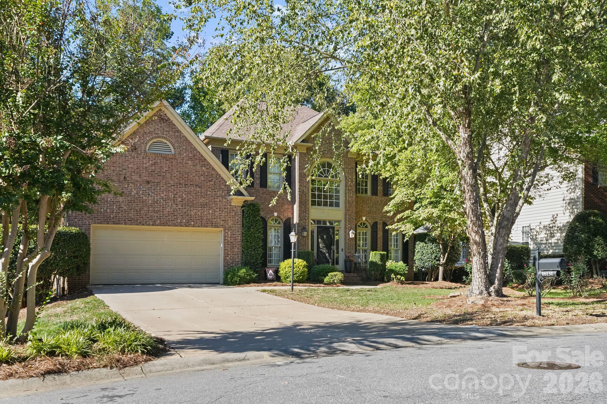 Located in the Northstone community and backing to the 3rd hole of the Northstone golf course, this all-brick home offers a welcoming setting, a spacious floor plan, and a main-level primary suite. Hardwood flooring adds warmth throughout the main living areas, which include a formal living room, dining room, and a comfortable family room with fireplace. The kitchen features freshly painted cabinets, double ovens, and a breakfast nook for casual dining. Upstairs, you'll find three additional bedrooms, two full bathrooms, and a versatile recreation room offering extra space for entertaining, hobbies, or relaxation. Attic storage provides additional convenience. The home also features several practical updates, including an AC unit and water heater replaced in 2023 and a garage door opener with keypad installed in 2024. Northstone is home to the private Northstone Club, offering golf, swimming pools, tennis, pickleball, fitness facilities, clubhouse, and dining. Club amenities require a separate membership and are not included in HOA dues. With its all-brick exterior, golf course setting, and flexible living spaces, this home offers a wonderful combination of comfort and functionality.