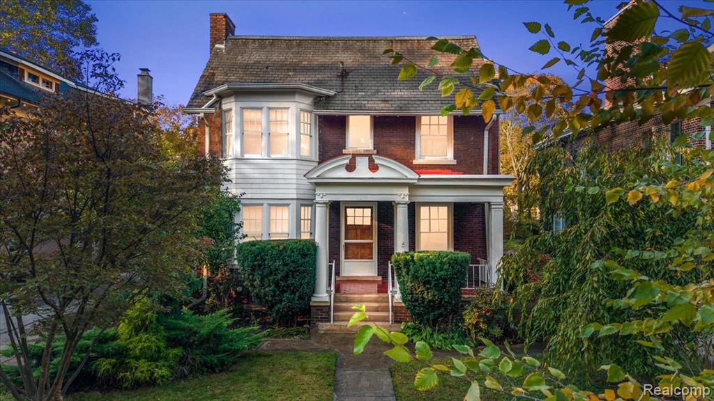 Step into this beautifully reimagined 3,000 sq ft home in the heart of Detroit’s Historic Indian Village, where timeless craftsmanship meets modern luxury. Spread across 3 levels, this 5-bedroom, 3.5-bath residence has been thoughtfully updated from top to bottom with new plumbing, electrical & mechanical systems, including 2 high-efficiency heating units with an AC and a tankless water heater—ensuring comfort and reliability for years to come.

Inside, the open-concept main floor welcomes you with 5" solid oak plank floors, a bright and airy living & dining space, and a custom contemporary kitchen featuring durable cabinetry, Arctic White quartz countertops, and designer finishes. A charming sunroom with original tile offers a serene corner, while a main-level office and a half bath with Italian designer tile provide flexibility & style.

Upstairs, you’ll find 3 spacious bedrooms adorned with restored oak floors and reclaimed fire engine doors—a unique nod to Detroit’s storied past. The main bathroom impresses with a cast iron clawfoot tub, a spa-like shower stall, bidet, and heated Italian-tiled floors, while the primary ensuite features marble heated floors & a walk-in shower. A conveniently located laundry room completes this level.

The third-floor studio is an inspiring retreat, finished with solid Ash hardwood floors, a skylight, and its own full bath with heated floors—perfect for an artist’s loft, guest suite, or private home office.

Outdoors, enjoy the second-floor cedar deck with a wrought iron railing overlooking a lush, landscaped yard filled with mature + young plantings—including cherry, pine, cypress, magnolia, dogwood, lilacs, roses, & more. A two-car garage and a full open basement offer ample storage & convenience.

Located on one of Indian Village’s most beloved streets, 2233 Iroquois blends historic charm with modern elegance, offering a rare opportunity to own a fully updated home in one of Detroit’s most distinguished neighborhoods.