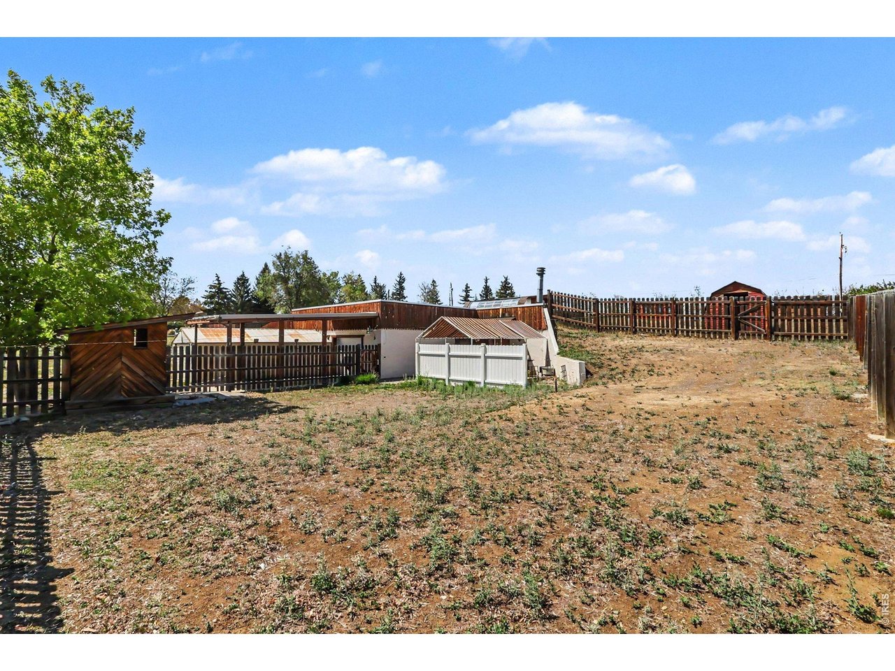 Rare 3-bedroom, 2-bath custom earth home on 1.56 acres in a prime Fort Collins-area location. Preppers Paradise. Built with 8-inch-thick walls for energy efficiency and very low utility bills, this unique property offers space, function, and flexibility. Zoned/allowed for up to 3 horses, with room to raise animals, expand, or build an additional shop. Includes four storage sheds, one attached to the huge workshop/garage-perfect for tools, toys, equipment, or hobbies. Conveniently located just 3 blocks east of College Avenue with easy access to I-25, CSU, Horsetooth Reservoir, shopping, and everyday amenities. A rare opportunity with land, utility savings, and endless possibilities.