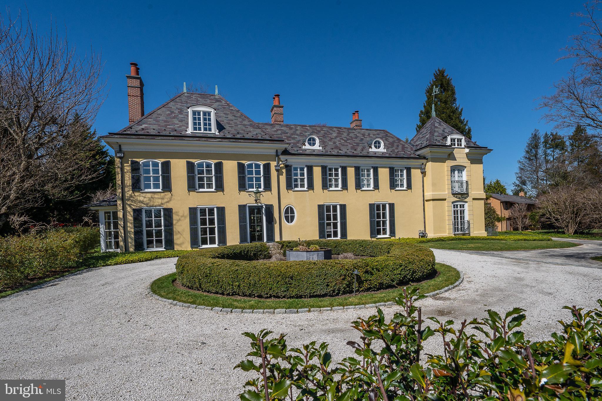 This French Country residence sits majestically on a gently rising, superior 1.5 acre lot in one of the best neighborhoods in northside Villanova on a walkable cul-de-sac.   An executive retreat featuring approximately 9000 square feet of exquisite living space which  was originally designed by the renowned architect, Walter K. Durham. The architectural goal of the 2018 renovation was to preserve and enhance the original dramatic "Durham" design elements, such as floor to ceiling windows to produce a home that is perfect for gracious entertaining or relaxing at home.  An open floor plan, coming in from the courtyard is seen visually  throughout the house to the gorgeous pool area and walled courtyard, creating a melding of interior and exterior spaces. The chef's dream gourmet kitchen opens up to a spacious great room with breathtaking views of the glorious grounds, pool, spa, terraces and pool house. Gracious room sizes with high ceilings, expansive bright windows and a wonderful open flow. The home features 5 en-suite bedrooms, 6 full and 2 half custom baths and a fully finished daylight lower level. The entire landscape was designed by an award winning Landscape Architect. A European gravel entrance circular auto court, rear walled courtyard, an Alee' of "tree form" white hydrangeas, magical English Oak Pyramid street trees, Blue Princess Holly detailing, extensive Belgian block borders and Pennsylvania Blue-stone capped walls. Vermont slate roof, copper down spouts and gutters, extensive exterior molding detail, one of a kind custom crystal and brass detailed railings, and much more.