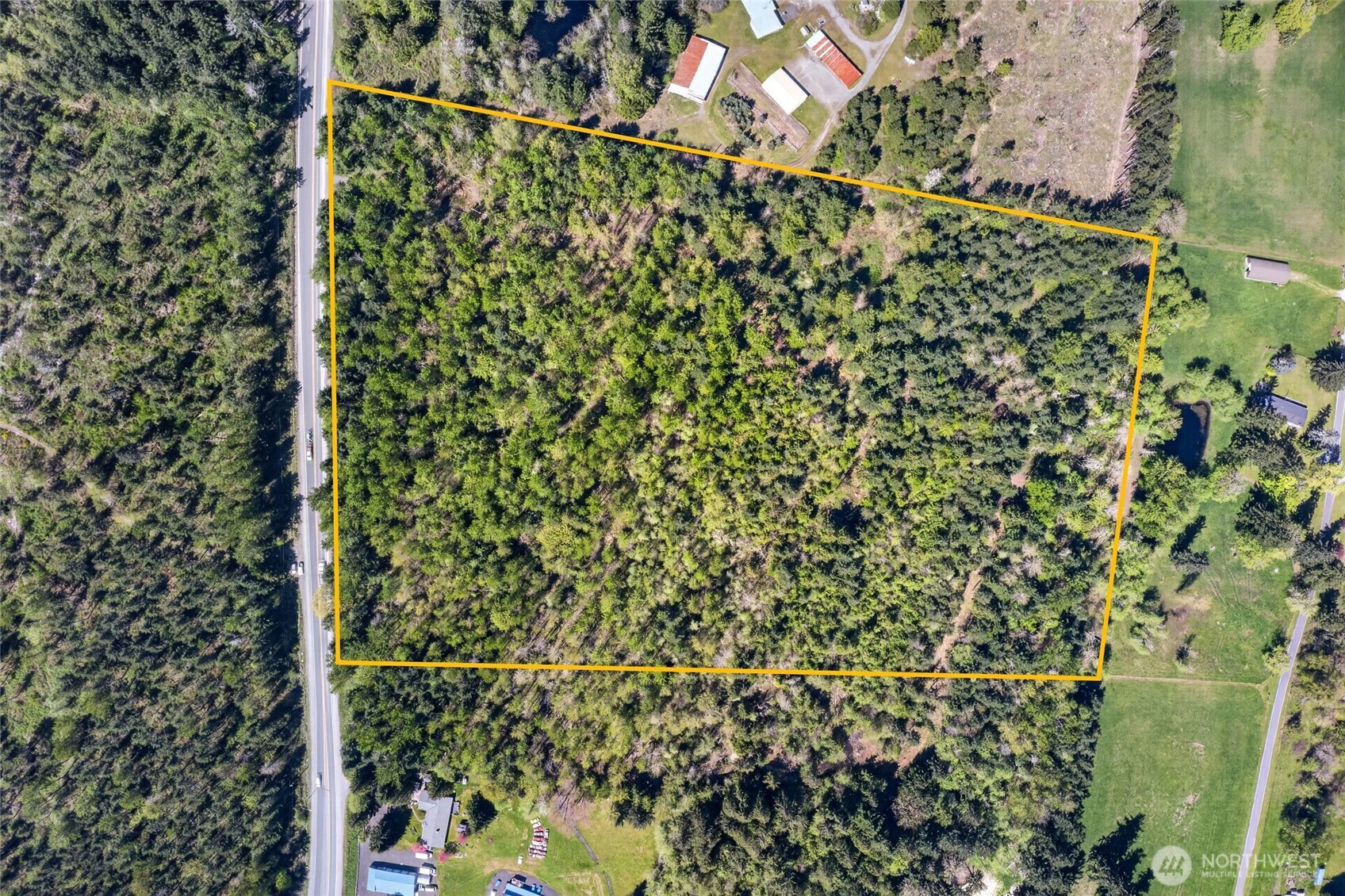 23.51 acres of prime Pacific Northwest beauty ideally positioned just off Mountain Hwy E in Graham, offering outstanding visibility and convenient access from Hwy 7. This expansive, heavily treed property showcases a rich blend of towering Cedar, Douglas Fir, and Hemlock, creating a serene, park-like setting with a true sense of seclusion while remaining close to key routes. Three parcels. The land is alive with wildlife—frequent sightings of deer and elk add to the property's natural charm, with well-established game trails weaving throughout the acreage. Whether you're walking the property or simply enjoying the quiet, you’ll appreciate the sense of being immersed in nature. Topography is predominantly level, making exploration and future planning easier, with some seasonal wet areas enhancing the ecosystem and attracting wildlife. The parcel offers flexibility with potential to divide/or possible lot line revision.- (buyer to verify), while currently benefiting from Designated Forest Land status for significantly reduced property taxes. This is a rare opportunity to own a substantial piece of land in a highly visible and accessible location—perfect for recreation, investment, or envisioning your future home in a peaceful, nature-rich setting. By appointment only.