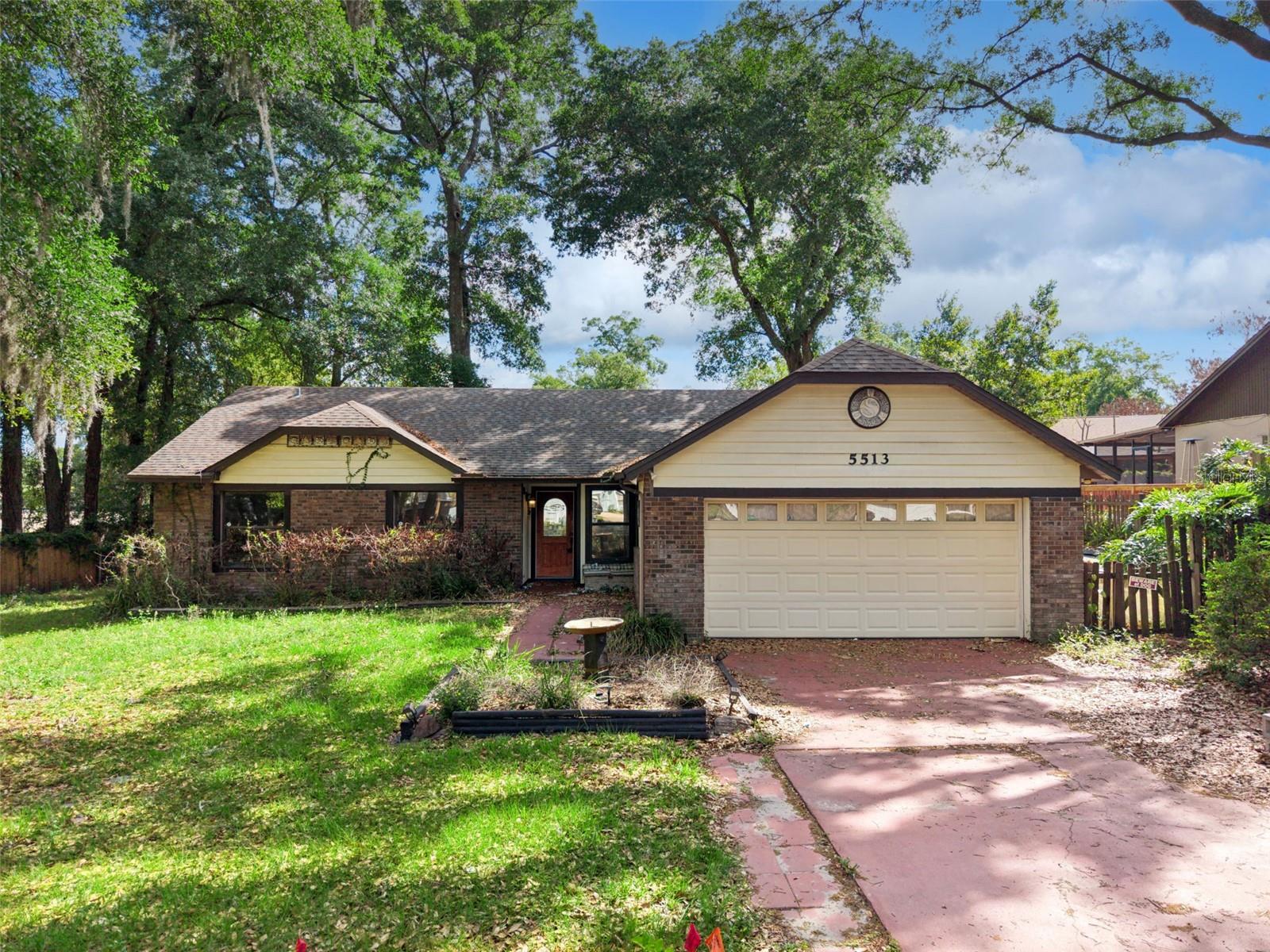 HUGE PRICE REDUCTION! Seller motivated! Tucked away on a quiet cul-de-sac in established Orlando neighborhood Windsong Estates, this spacious home offers comfort, privacy, and exceptional value on an oversized .29-acre lot. This spacious single-family residence offers 1,712 square feet with 3 spacious bedrooms, 2 bathrooms, plus a versatile office/flex space that can be used as a home office, gym, den, playroom, or whatever best suits the owner's needs. One of the standout features is the oversized screened-in patio—an ideal extension of the home for relaxing mornings, entertaining guests, or enjoying Florida evenings bug-free. The generous lot offers room to garden, play, or create your own outdoor retreat. Conveniently located near major roadways, this home provides quick access to Downtown Orlando, shopping, dining, and everyday essentials. Enjoy being approximately 30 minutes from both Walt Disney World Resort and Universal Orlando Resort, and Lake Orlando Gold Club making this location ideal for homeowners and investors alike. Whether you are looking for a place to call home or a fantastic investment opportunity, this is the one! Schedule your private tour today!