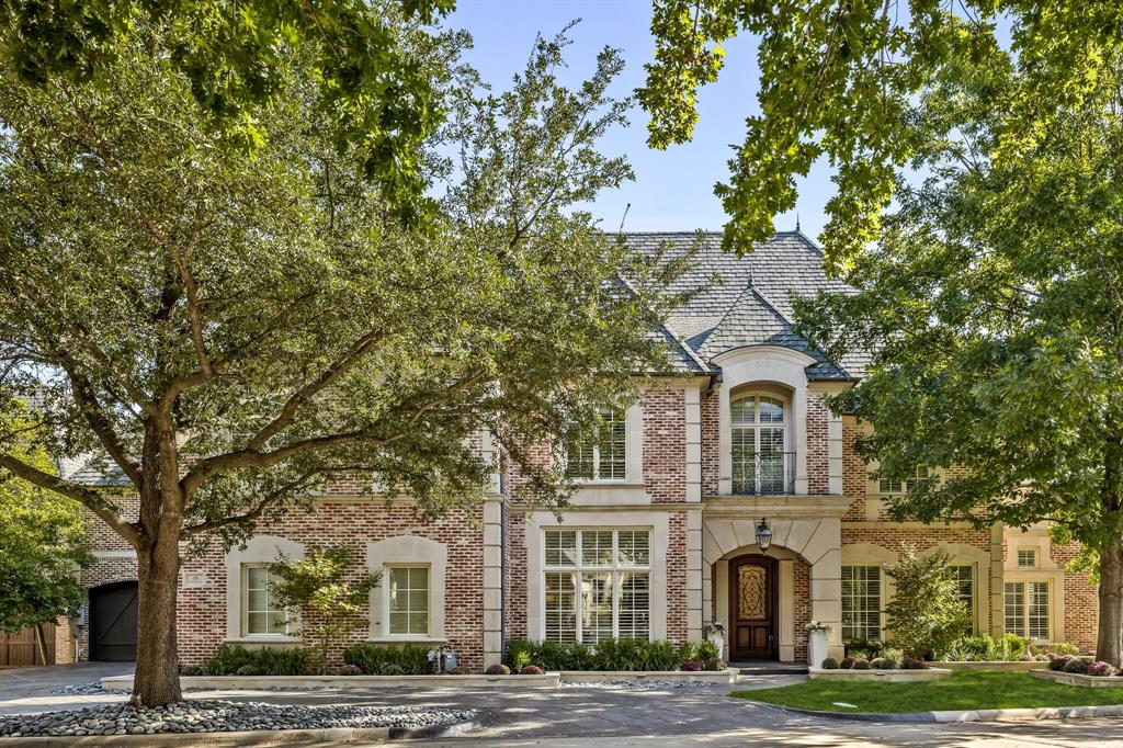 Nestled within the prestigious, guard-gated community of Glen Abbey, this exquisitely crafted 6-bedroom, 6.2-bath estate by Hawkins-Wellwood Homes blends timeless architecture with elegant, soft contemporary styling. Set among mature trees, backed by a peaceful creek, this 6,998-sq-ft residence was refreshed and remodeled in 2022 under the design direction of Jennifer Colby Interiors.Step inside to find 25ft vaulted ceilings, custom wood rafters, a dramatic living room with an elegant stone fireplace, and a gourmet kitchen reimagined with Wolf and Sub-Zero appliances, designer quartzite counters, custom cabinetry, and Entek hardware. The first-floor primary suite is a sanctuary with 15-ft ceilings, dual walk-in closets, and a spa-inspired bath opening to the patio.Smart-home features include Control4 automation, Lutron dimmers, built-in speakers, AppleTVs, and phone-controlled lighting, sprinklers, and security. Enjoy resort-style outdoor living with a saltwater pool and spa, covered patio with fireplace and electric screens, and a detached cabana featuring a Viking chef’s kitchen and bar—all surrounded by lush, creekside landscaping.Additional highlights: Neighborhood fitness center, new roof (2023), soft-water system, extensive millwork, and a 3-car garage. Glen Abbey offers a private fitness center, water features, and convenient access to the nearby Bent Tree Country Club. Families will also enjoy convenient access to Trinity Christian Academy, Prestonwood Christian Academy, and Parish Episcopal. This is luxurious executive living in one of North Dallas’s most exclusive enclaves.