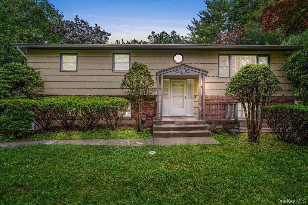 Thoughtfully expanded and stylishly renovated, this remarkable home combines comfort, practicality, and contemporary elegance. On the upper level, you’ll find a bright sunroom adjacent to the kitchen, a brand-new custom kitchen and bathrooms with granite countertops, and a generous walk-in pantry. The expansive master suite showcases a spa-like primary bath and spacious walk-in closets. The fully finished lower level provides private guest quarters with five additional rooms and a garage—perfect for hosting extended family, visitors, or accommodating versatile living needs. Outside, enjoy a secluded, professionally landscaped yard with fencing, a tranquil man-made pond, mature landscaping, an oversized shed, ample driveway parking, two porches with a sukkah awning, and a playground. Whether for entertaining or quiet relaxation, this move-in ready residence is a truly rare find!