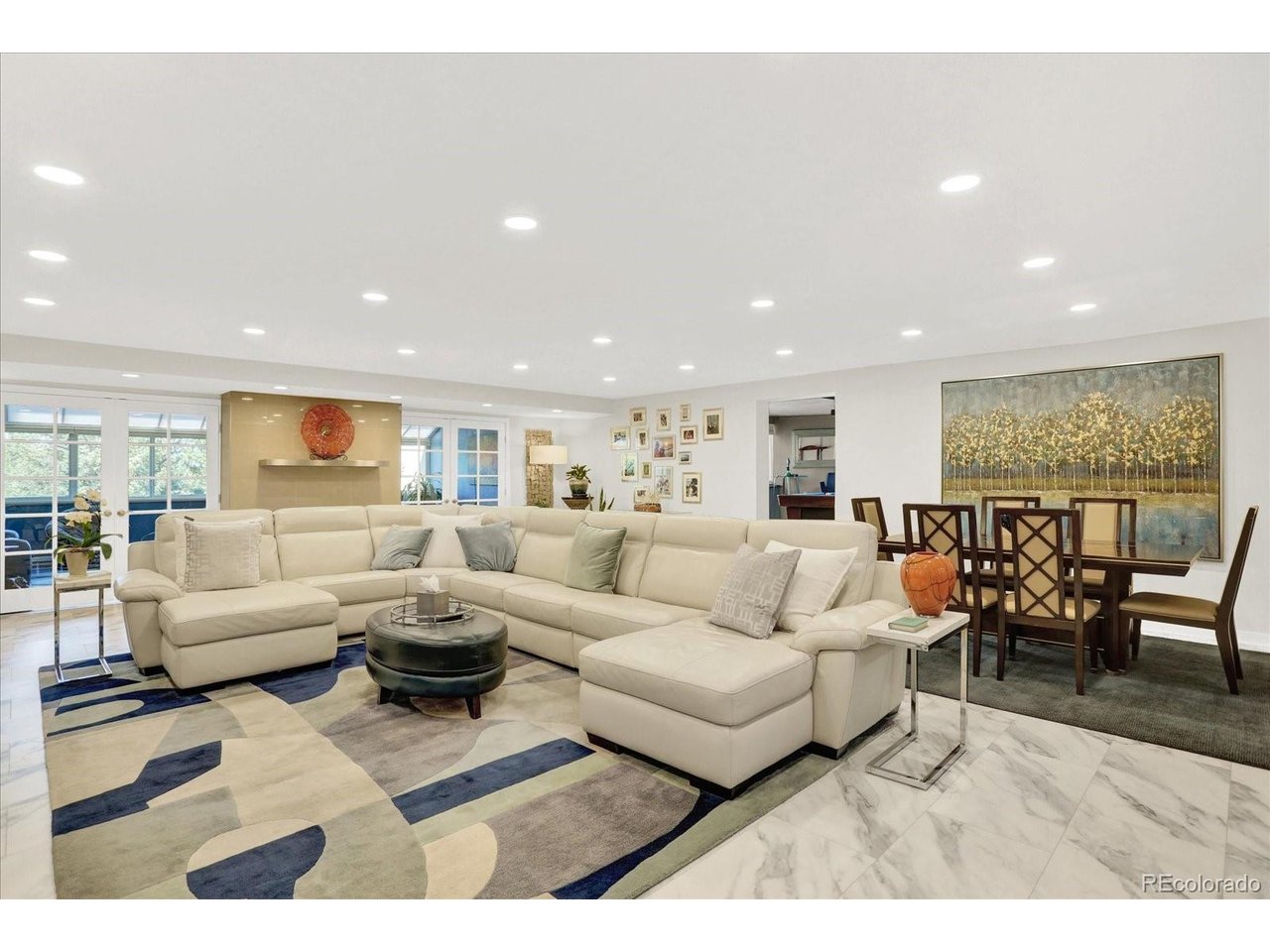 Truly a move in ready opportunity awaits *The Promontory is a uniquely special gated community that will surprise you *Uncommon, mature, treed setting on 7 private acres for a park like setting *Can be negotiated as a complete turnkey residence with all designer inspired furnishings *Seller Financing offered to qualified Buyers *Spacious layout is the epitome of an open floorplan, offering over 3,000 sqft of elegance *Thoroughly updated with impeccable finishes *3bed/2ba floorplan that accommodates multiple uses with a fully enclosed sunroom that opens to the main living area, a separate media/game/home office room, as well as a windowed office nook off the primary suite *Thoughtfully improved and updated over the years plus carpet free living *Well-equipped, bright kitchen with gorgeous solid surface quartz countertops , smooth cooktop, convection double ovens, including all stainless steel appliances *Counter seating makes for exceptional functionality and entertaining *Sunny living room with a tasteful fireplace *Large formal dining *Convenient laundry  and pantry *Storage is truly abundant with a large mudroom and multiple walk-in closets *Parking in the secured underground garage has elevator service to the two deeded spaces  *The mature grounds offer a pool deck area, walking trails and water features, all within the friendly confines of the complex *Excellent guest parking *Paid water, sewer, trash for maintenance free living *Remarkable Lock and Leave opportunity *Great walkable neighborhood, minutes to everything imaginable *Remarkably convenient location with good access and commutes in every direction *Ample shopping, groceries, entertainment, recreation, amenities all nearby ...yet still tucked away in a quiet neighborhood setting *Come make this uniquely comfortable home yours!