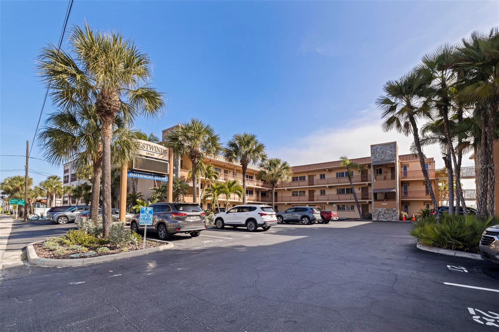 Set on the Intracoastal with Treasure Island's beach just across the street, this third-floor, 2 bedroom, 1 bath condo at Westwinds Waterfront Resort offers dolphins at the docks, sunsets over the water, and a strong rental history with excellent guest reviews. It's equally at home as a personal getaway or a proven rental.Completely remodeled with everything new, from the kitchen cabinets and backsplash to the fully renovated bathroom with a sleek walk-in shower, plus new flooring, trim, and paint throughout. Every piece of furniture is brand new and high-end, so there's nothing left to buy or replace. The standout upgrade is the reconfigured layout, which adds a second bedroom/den to make the most of every square foot, expanding sleeping capacity and maximizing rental revenue. Truly turnkey, at a price that pencils out.Westwinds puts the best of Treasure Island at your door. Spend the day lounging by the heated pool, then fire up the grills and gather at the picnic tables as the sun goes down. Three docks make it easy to tie up a boat or jet ski for the day or cast a line. Elevator access, a dedicated parking spot, and on-site laundry make every stay easy. Publix, local restaurants, and beach bars are all within close distance. With no minimum stay requirements, you can rent nightly, weekly, or seasonally on your terms.The condo is currently professionally managed, and the buyer has the option to continue with the current management for a seamless transition. Future reservations are already on the books, so it starts earning from day one. Rental history is available upon request. For added peace of mind, the building has completed its Phase 1 milestone inspection with no Phase 2 required. All assessments related to hurricane/SIRS are completed and paid as of October 1, 2026.Pinellas County records reflect 1 bedroom, 1 bath. Buyer to verify all room uses and measurements.