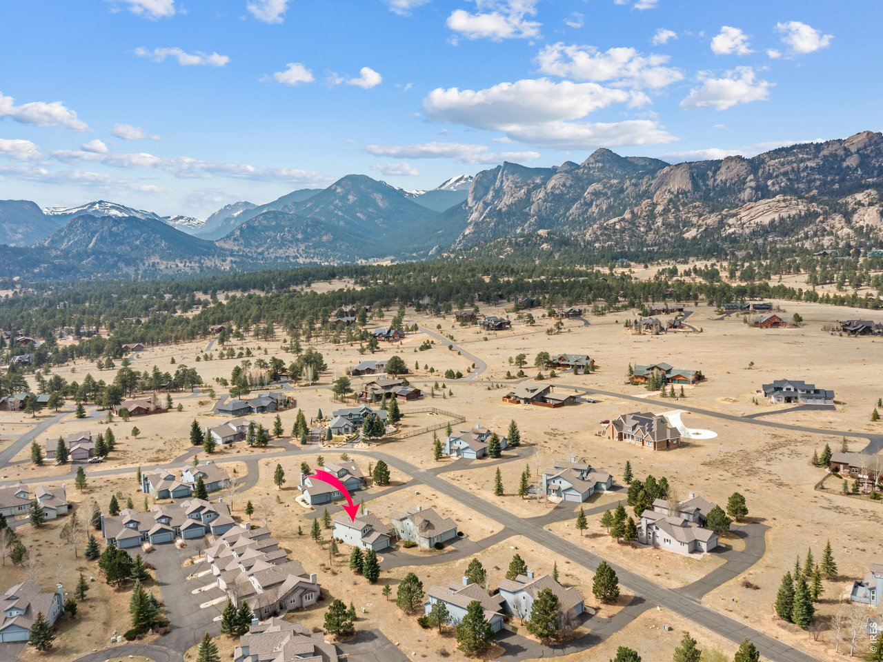 Gorgeous freestanding 3 bedroom and 2.5 bathroom townhome on the south side of Estes Park, Colorado with stunning views and abundant natural sunlight. The lower level features main level living and open floor plan with hardwood floors and a beautifully appointed kitchen with granite counters. The spacious primary suite offers a private bath, walk-in closet, and scenic views. In the living room, enjoy a custom tiled fireplace, vaulted ceilings, a dramatic wall of windows, and walkout access to the deck-perfect for soaking in the mountain surroundings. Upper level has a loft, 2 bedrooms and a full bathroom. An oversized garage provides extra storage space, and so many thoughtful upgrades include central air conditioning. For added convenience, select furniture and furnishings may be negotiable. Rarely available, this mountain townhome offers the privacy of no attached neighbors in beautiful Estes Park, Colorado.