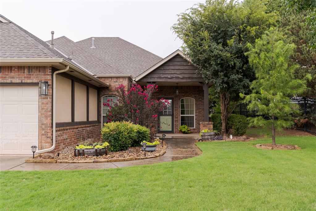 Tucked into the highly sought-after Covell Village community, this beautifully updated 5-bed, 3-bath home pairs fresh, modern updates with a layout built for real life. It's just steps from the community pool and playground, with a nearby pond and walking trails to enjoy as well. Within minutes from Mitch Park, you'll find great local shopping and dining. Inside you'll find a thoughtfully designed open-floor plan with stylish touches throughout. The kitchen has been newly renovated with stunning countertops, cabinetry paint, hardware, backsplash, and maximized pantry storage. Updated light fixtures add a polished, contemporary touch to every room, and smart home features throughout the house can be connected to your smart hub of choice. This home offers 5 bedrooms total, designed with flexibility in mind. One bedroom is perfectly suited as a home office, while an added flex space serves as a bonus room — ideal for bedroom, office, library, home gym, or additional living area to fit your lifestyle. The primary ensuite offers a spacious bedroom, large walk-in closet, and the primary bathroom includes double vanities, a shower, and soaking tub. The remaining 2 bedrooms offer comfortable, versatile living space for family or guests. Say goodbye to high electric bills — this home is equipped with solar panels, keeping costs minimal, with buyback for surplus energy. Outside, the backyard is built for relaxing and entertaining, featuring two patios — one covered for shaded evenings, and another ready for your own personal touch. A small garden space is just waiting for a green thumb to bring it to life. The storm shelter is located in the 3-car garage.