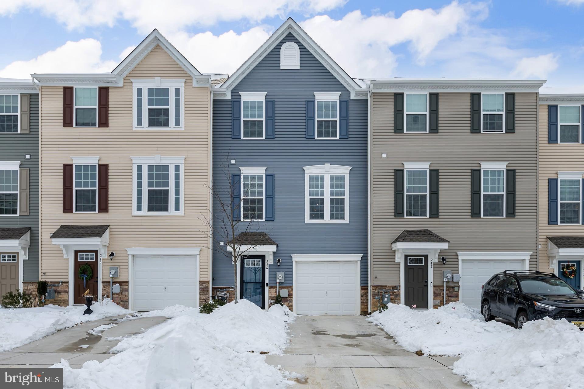 Welcome home to the Strauss model, the largest model available, offering the perfect blend of modern design, functionality, and energy efficiency. This beautifully upgraded home features luxurious finishes throughout.  The first floor offers a spacious great room with new vinyl plank flooring, a convenient half bath, and access to the fenced rear yard with patio, perfect for outdoor enjoyment. The second floor showcases an open-concept living and dining area and an extended kitchen complete with espresso cabinets, granite countertops, a large island, and a built-in hutch, along with outdoor access to a private deck—ideal for entertaining.  The third floor features a luxurious primary suite with a tray ceiling, large walk-in closet, and a spa-like primary bathroom with jacuzzi tub and oversized walk-in shower. Two additional bedrooms and a full hall bath complete this level.   Additional recent improvements include new carpeting on stairs, recessed lighting with Alexa control, a new central air conditioner and a French drain in the rear yard for added peace of mind.  Ideally located near the Atlantic City Expressway, Philadelphia, shopping, dining, and malls, with a park within walking distance, this home offers comfort, convenience, and style. Don’t miss this exceptional opportunity—schedule your private showing today.