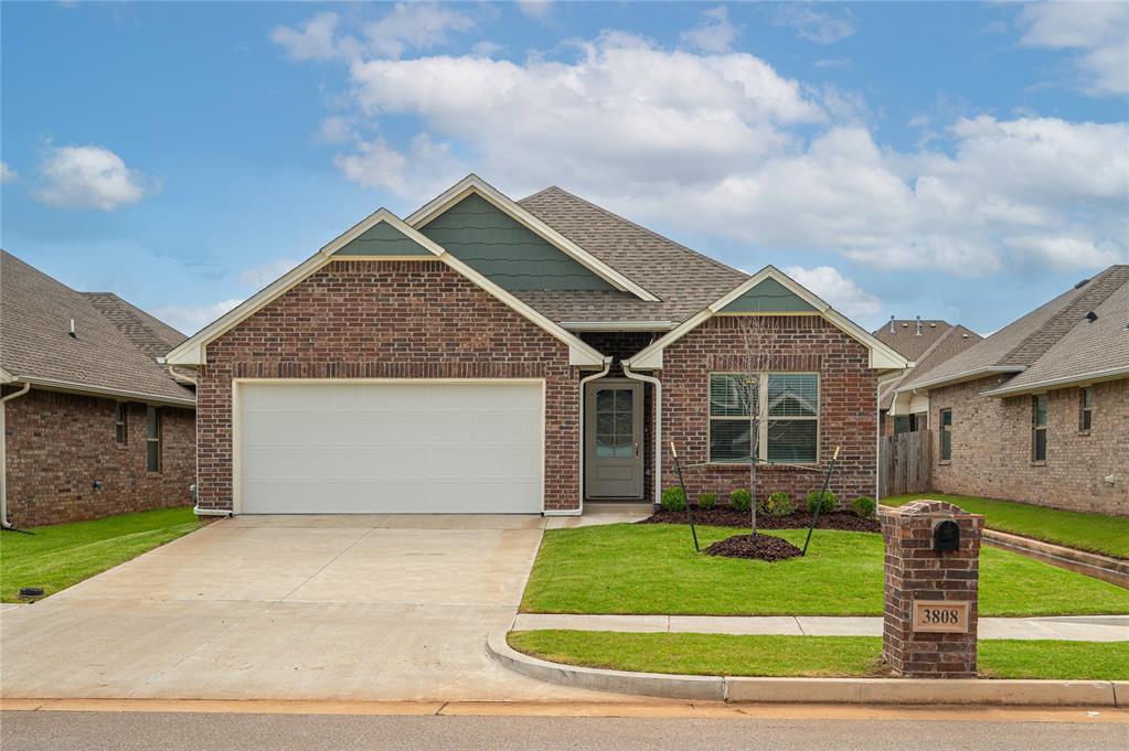 This open concept floor plan features 1,875 sq. ft. of total living space, which includes 1,785 sq. ft. of indoor space & 90 sq. ft. of outdoor living. There is also a 390 sq. ft., two car garage w/ a storm shelter installed! This pleasant home offers 3 bedrooms & 2 full baths. The great room holds a corner gas fireplace, a ceiling fan, & 2 great windows that you will absolutely love! The kitchen has a huge island topped with 3 CM countertops, exquisite stainless-steel appliances, pendant lighting, & remarkable cabinets. Primary suite includes a ceiling fan with a beautiful sloped ceiling detail while the primary bath has a walk-in shower, a Jetta Whirlpool tub, separate wide vanities, & a spacious closet. The back patio is perfect- covered with a wood-burning fireplace, a gas outlet for your grill, & TV hookups. Other amenities this home has are Smart Home technology, a whole home air filtration system that will make breathing easy, a Rinnai Tankless water heater, and R-44 insulation! Don't miss your chance to call this home!