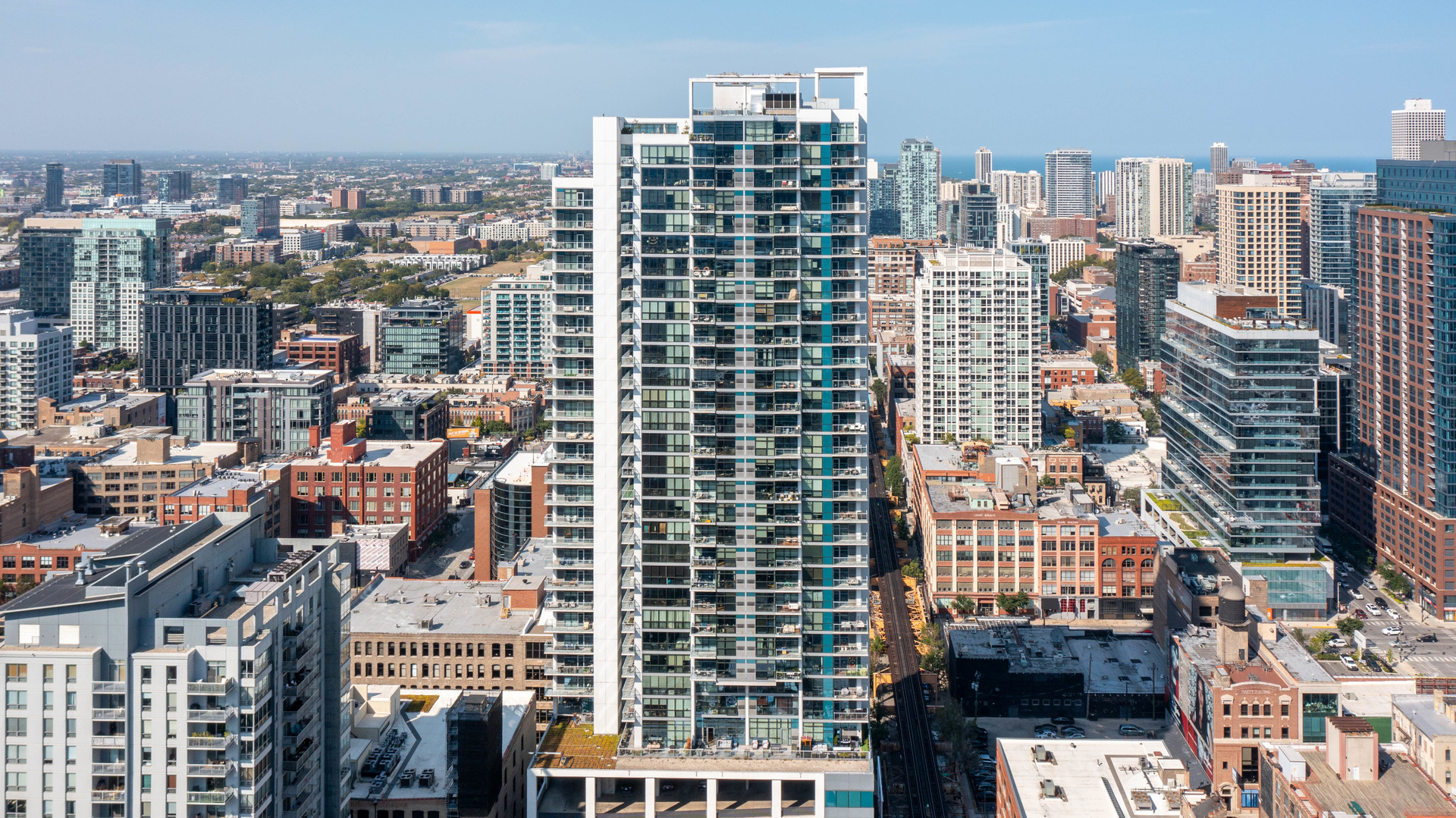 Forever city skyline views and peeks of the lake from this north east corner residence. super wide and deep Balcony, couch grill, table- fits it all! Modern vibes- floor to ceiling windows, bamboo floors, custom aluminum frame & glass doors, custom window shades. All Kitchenaide stainless appliances ( Gas/steam range), Cashmere white granite counters, under mount sink, designer hardware and gray glass tile backsplash. Spacious natural stone bathroom with single sink vanity, glass enclosed shower and tons of counter space. Front load LG steam washer and dryer. Freshly painted and new gorgeous gray heather carpet in the bedroom. Designer lighting, Full amenity building with 24 hour door staff and on site engineer. Gym, two sun decks, electric car charging station, guest parking, and additional storage. Two side by side garage parking spaces: one included in the price and another for $35,000. Enjoy proximity to East Bank Club, Chicago River Walk, dog parks!, Avli, Torchio, Zarella Pizzeria, Schneider's Deli,Target. Walk to Michigan avenue, Lake Shore Drive, Oak Street Beach. Super convenient location for commuters and such an easy lifestyle for those who walk to work. The building is in stellar shape with a recent facade project just completed, new Butterfly MX keyless entry, and new garage doors for heightened security. Incredible staff including: security, 24 hour doorman, engineer, maintenance, and on site manager.