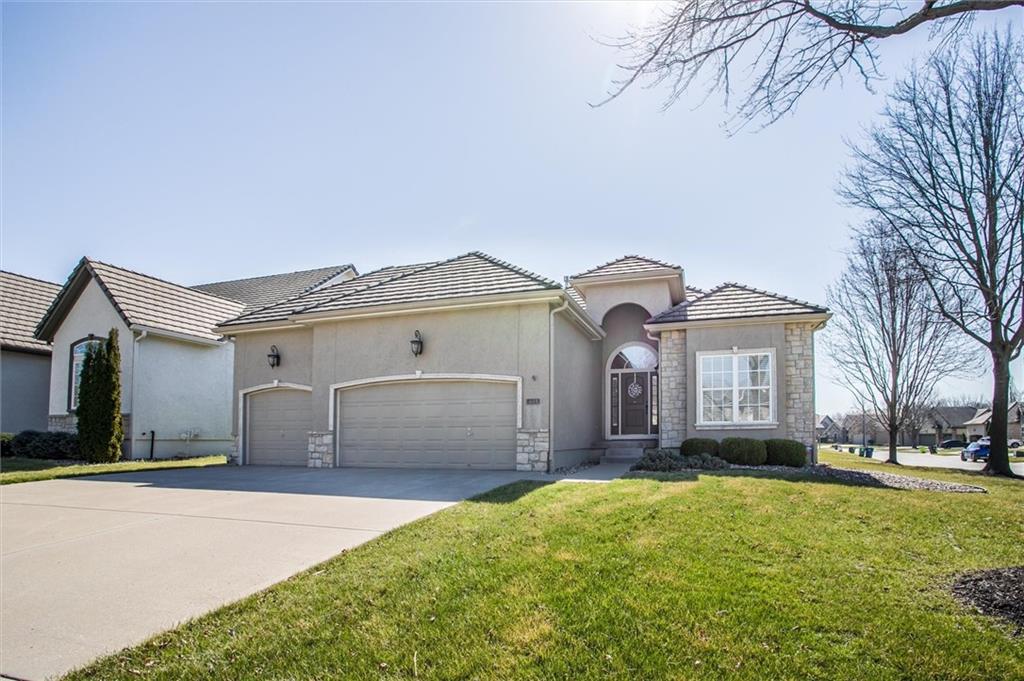 Beautiful ranch villa in Lakewood, meticulously maintained and truly move-in ready. The kitchen features stunning granite countertops and a custom-built island perfect for casual dining and gorgeous custom cabinets and walk in pantry. The spacious great room offers plenty of room for a dining area and is highlighted by a beautiful stone-surround fireplace.Two generously sized bedrooms are located on the main level, providing comfort and convenience. The primary suite includes dual vanities, a separate tub and shower, and a large walk-in closet.The lower level offers abundant storage space along with an additional bedroom—ideal for a home office or guest suite.Enjoy all the exceptional Lakewood amenities, including a golf course, scenic trails, clubhouse and restaurant, tennis courts, and three swimming pools.