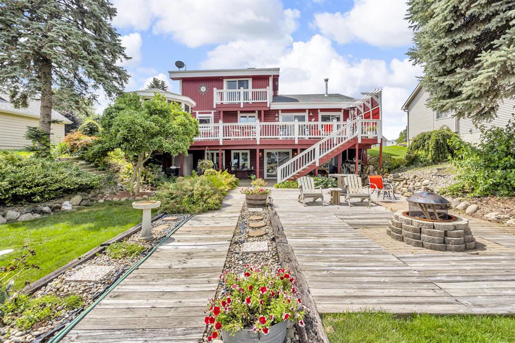 QUALITY CUSTOM BUILT LAKEFRONT SPLIT LEVEL LOG HOME. 4,700sqft of living space located on desirable All Sports Loch Erin with 3 bedrooms, 3 full baths a HUGE living room with cathedral ceiling & fireplace. Lakeside kitchen, dining & deck makes this a perfect entertaining space. Custom wet bar, spa with hot tub, sauna & walk in shower. Billiard/rec room with a gas fireplace along with a second living room with wood burning fireplace. Fully heated/cooled workshop area with built in tanning unit. Lakeside Gazebo, gardens & strategically placed flowering plants that bloom through out all the seasons. Huge sun deck waterfront with dual docks making for a highly desirable boat slip. 2.5 car garage. All top quality appliances & so many amenities to mention makes this one a MUST SEE FOR YOURSELF!