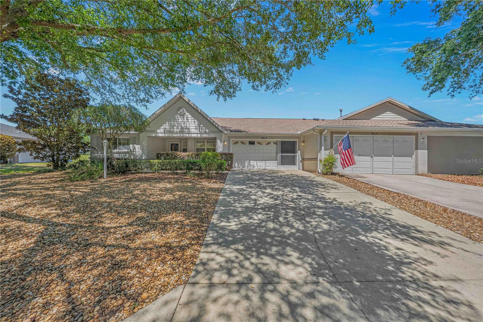 Welcome to easy living in On Top of the World, one of Ocala's premier 55+ communities with endless amenities and an active lifestyle. This charming home is perfectly situated on the golf course overlooking the 2nd tee, offering peaceful views and a relaxing setting.Inside, you'll find a spacious two-bedroom, two-bath split plan with all tile flooring throughout for beauty and easy maintenance. The open-concept living and dining areas create a bright, inviting space for entertaining or everyday comfort. The front kitchen features a sunny breakfast nook, pantry, stove, refrigerator, dishwasher, microwave, and convenient pull-out lower cabinets.The guest bedroom is currently set up as a home office with a phone jack and electric in the closet, making it ideal for hobbies or remote work. The guest bath includes a tiled surround, durable cast-iron tub, and grab bars for added safety.The oversized primary suite offers a true retreat with his-and-her walk-in closets, a large linen closet, double sinks, and a step-in shower with grab bars and raised seat.Additional highlights include a bonus room, screened lanai with fan and tiled floor, tiled front porch with cozy sitting area, solar tubes in the living room and primary bath for added natural light, irrigation system, gas heat, gas hot water heater, and garage with washer, dryer, utility sink, and screened garage doors.Enjoy the Florida lifestyle you've been dreaming of in Ocala. For community amenities and more information, visit On Top of the World.