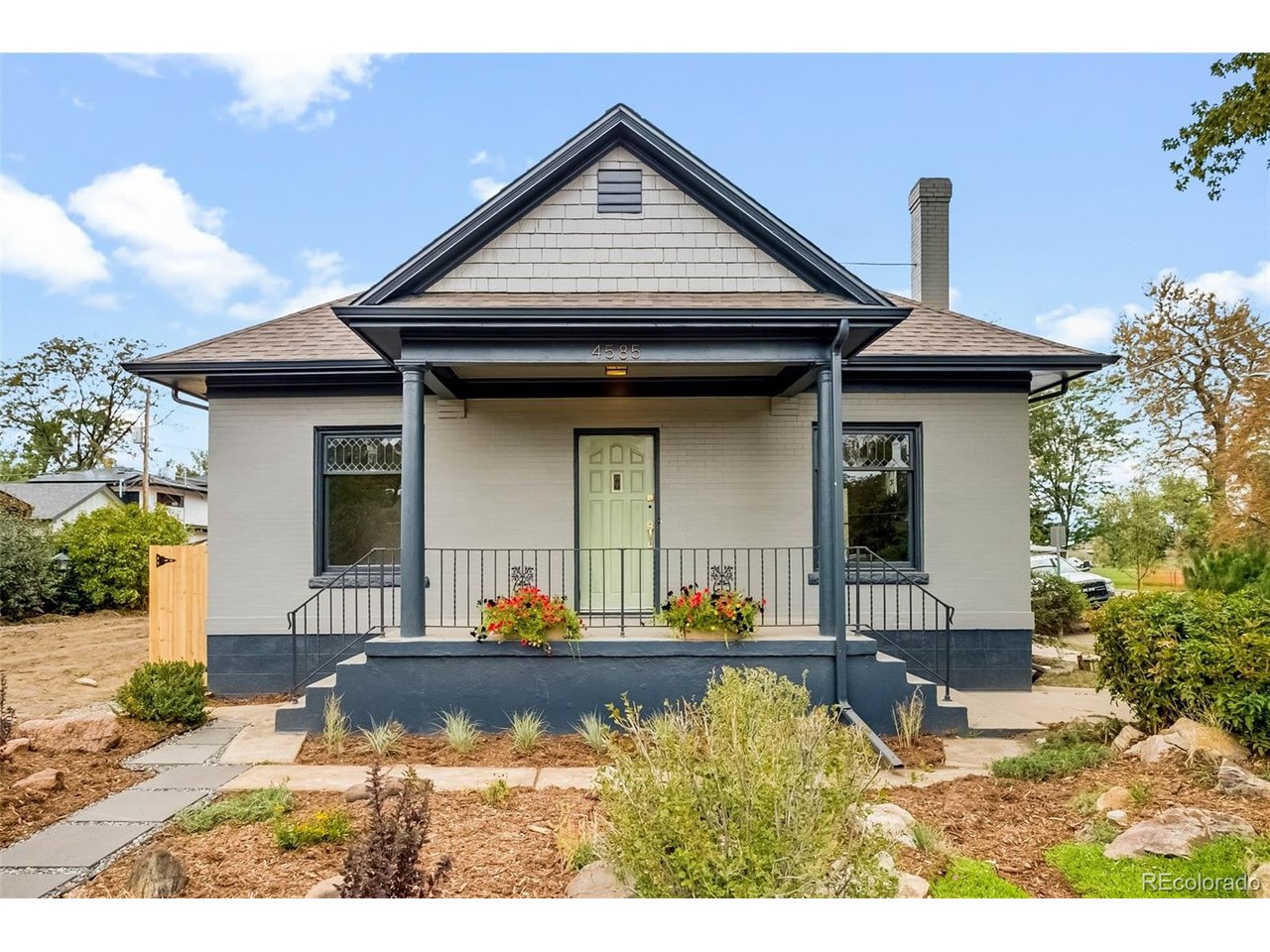 Picture-Perfect Remodeled Berkeley Bungalow Across From the Park!This beautifully remodeled bungalow keeps the historic charm buyers love, like original stained-glass windows and a wood-burning fireplace, and it's been updated for how people live today. The kitchen is brand new, the hardwood floors on the main level have been refinished, the basement has all-new flooring and drywall, and the home has fresh paint inside and out. The floorplan is one you won't often see in a bungalow: 3 bedrooms and 2 bathrooms all on the main floor, plus a big, open lower level ready for a rec room, home office, gym or guest space.Step outside and Berkeley Park is right across the street. Its 85 acres include a library, a rec center, an off-leash dog park, tennis courts and a sparkling lake. Just steps away is Tennyson Street, Northwest Denver's favorite shopping district, lined with boutiques, restaurants, galleries and a theatre.The big-ticket items are already done: a new boiler system, a new water heater, updated electrical and plumbing throughout, and a cleaned and scoped sewer line. A new water-wise, low-maintenance landscaping package means more time enjoying the park and less time on yard work.Charm, updates, and one of Denver's best locations. *The lot was recently reconfigured, so county records may not show the current lot size. Buyer to verify. Basement ceiling height is 7' in most sections, with the exception of a few chases that are approx. 6'6"