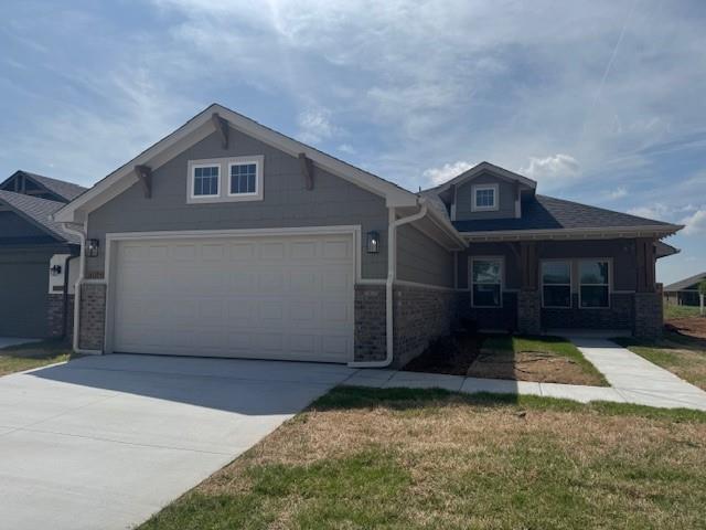 BRAND NEW ENERGY EFFICIENT CONSTRUCTION in the Ideal Homes Featherstone / Native Plains communities in SWOKC - Moore schools.  3 bedroom home with wood-look tile throughout the main living areas, carpet in the 3 bedrooms.  Master suite to the back of the home with double vanity, garden tub and separate tile shower.  Secondary bedrooms to the front side of the home complete with ceiling fans.  Mud bench in the utility with access to the garage.  Kitchen features stainless steel gas range, built in microwave, dishwasher, disposal, pantry and a large center island for prep space.  Large covered back patio with small fenced backyard, pet friendly with additional refundable pet deposit.