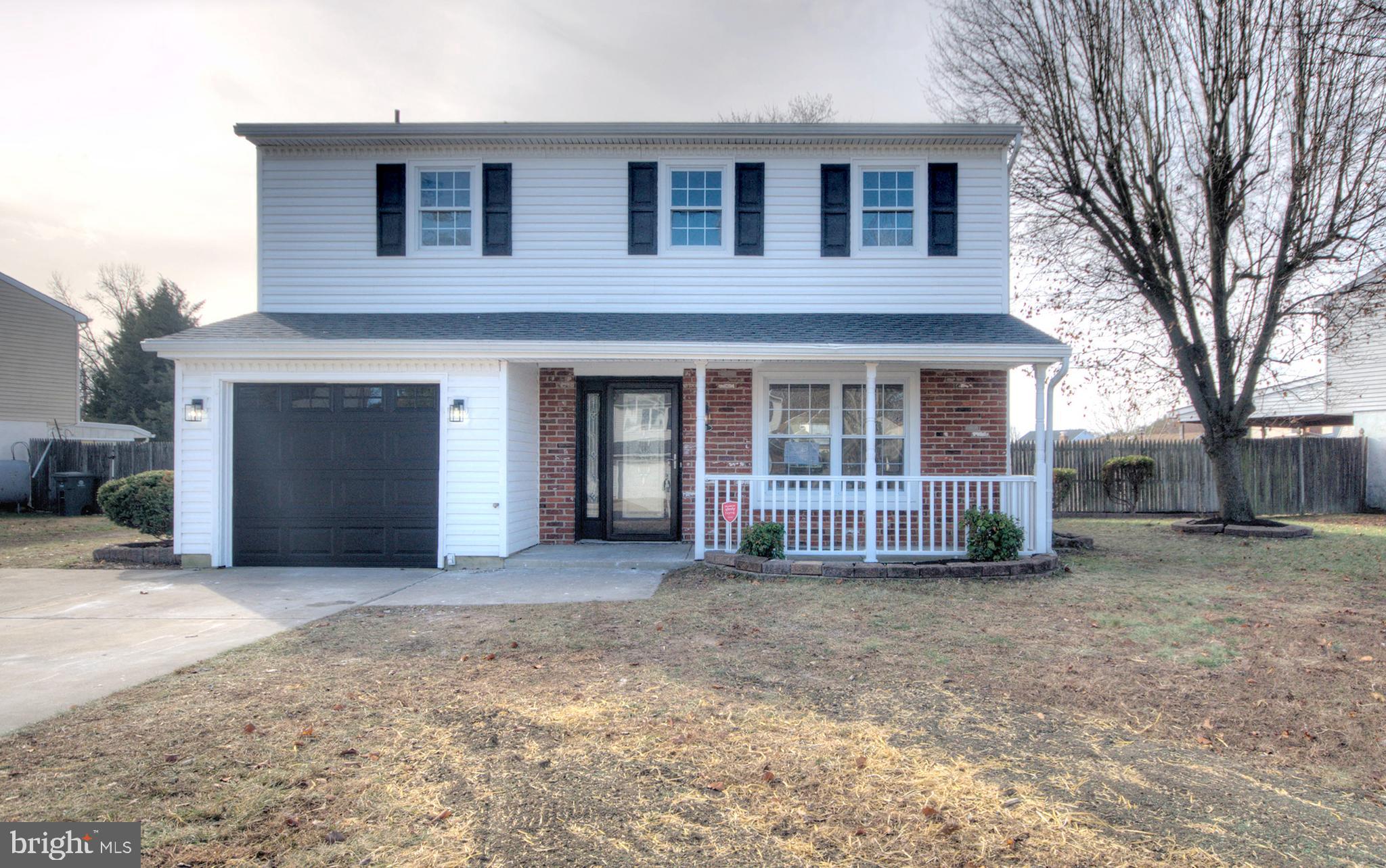 WOW! This stunningly transformed home has been fully renovated inside, combining modern design with everyday functionality in a charming Williamstown neighborhood.Step inside to a spacious living room that flows seamlessly into the formal dining area, perfect for entertaining or family gatherings. The gourmet kitchen features a beautiful mix of wood and white shaker cabinets, premium finishes, designer lighting, and elegant tiling throughout. Adjacent, the family room boasts a full brick fireplace, creating a warm and inviting space that overlooks a large, private backyard. A convenient laundry room and powder room complete the main level.Upstairs, the home offers three bedrooms, including a luxurious primary suite with a walk-in closet and floor and wall tile in the bath and shower. The hall full bath is tastefully designed with wall-to-floor tiling, reflecting high-end craftsmanship and style.This move-in-ready home is perfect for buyers seeking modern renovations, stylish interiors, and comfortable family living. * Reminder that the HVAC, ROOF and HWH are all NEW!!!