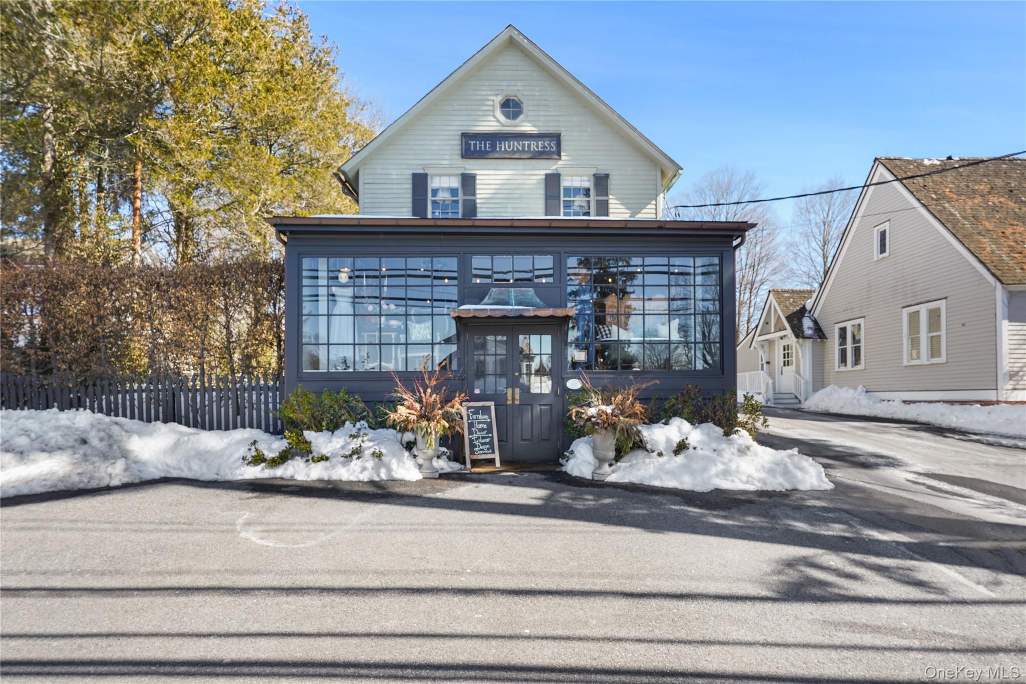 INVESTMENT OR END-USER OPPORTUNITY......Directly across the street from one of the most notable restaurants in Northern Westchester - The Inn at Pound Ridge by Jean-Georges is this mixed-use offering composed of three unique spaces.  A mixed-use property perfect for an end user or Investor!PROPERTY OFFERING AT A GLANCE: (1) A fully renovated main building/showroom/retail with a 1.5M infusion in improvements. (2) Three-bedroom 2-bath exquisite residential rental and (3) Two-story renovated barn. CAN BE delivered tenant occupied with signed leases as an investment, or vacant for end user!INVESTMENT: Income-producing property suited as an investment offering a strong return with long-term tenants in place and room for additional income in the huge, newly renovated storage barn. All tenants to continue leases, encouraging years of guaranteed income. OR an end user can come in and make this their own with the benefit of added rent from the apartment.Now let’s get to the property details:(1) RETAIL SHOWROOM: Expansive showroom and large retail offering with appointed kitchen and bath- this very large open space features wide plank reclaimed hardwood flooring, ample lighting, and an inviting area for work or retail or general office.(2) RESIDENTIAL APARTMENT: Private entry and appointed private outdoor patio space. Incredible design and details with a large great room with a vaulted ceiling. Primary Bedroom showcases a vaulted ceiling, primary bath with claw-foot tub and a walk-in closet. Two bedrooms share an appointed bathroom.(3) TWO STORY BARN: Entire space has new Heat and AC with first floor garage/storage space/utility room. The second floor offers and large expansive space/studio/office and can possibly be converted to residential. Space is currently storage with options for added rent that can be office/residential.THE STORY: Located in the heart of the historic hamlet of Pound Ridge, this building was the former Samuel Parker house that was built in 1860. The mixed-use building was the old Schelling’s Market, and Samuel Parker Cafe. After a complete interior and exterior renovation, it currently features, The Huntress, a high-end Interior Design and retail home furnishings store. This unusual offering has high visibility on the corners of Routes 124, 172 and 137. Right next door is the town-owned Conant Hall and nearby to the Hiram Halle Library and Pound Ridge Historical Society. Ample on-site parking.