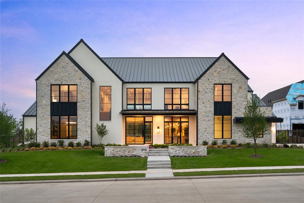 Showstopping custom estate in the exclusive gated enclave of Hills of Kingswood in Frisco, designed as a private resort-style retreat. This architectural statement blends modern luxury with curated, design-forward interiors white oak floors, bespoke cabinetry, custom marble surfaces, and elevated designer finishes throughout. A dramatic steel pivot entry creates a bold arrival, while expansive glass openings connect effortlessly to resort-caliber grounds with a pool, cabana, sunken fire lounge, sport court, and dual outdoor kitchens. Inside a chef’s kitchen with Wolf, Sub-Zero, and Miele appliances plus prep kitchen. Five full ensuite bedrooms and a true spa-inspired primary suite with sauna and steam room and large walk-in closet. Climate-controlled wine room and private theater with award-winning Theory Audio Design sound. Full home automation includes lighting, audio, surveillance, and WiFi, delivered with white-glove orientation.
