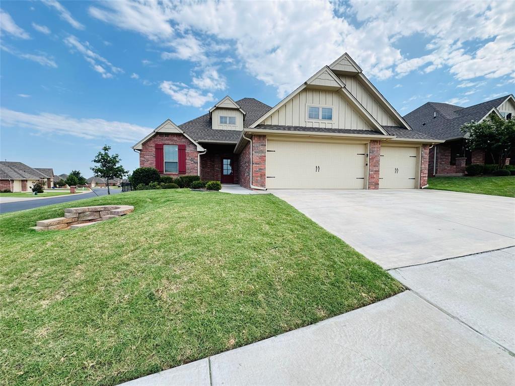 Better than new Homes by Taber home with 4 bedrooms, 3-car garage, storm shelter, and an incredible outdoor living space! This popular Hummingbird Bonus Room floor plan offers an open-concept design with soaring ceilings, a stunning coffered ceiling, stacked-stone fireplace, and abundant natural light. The chef's kitchen is the centerpiece of the home, featuring ceiling-height cabinetry, quartz countertops, designer backsplash, built-in stainless steel appliances, custom vent hood, and a large island that's perfect for entertaining. The private primary suite is a true retreat with a spa-inspired bath offering dual vanities, a jetted soaking tub, oversized walk-in shower, and spacious walk-in closet. Step outside to the covered patio with an outdoor fireplace overlooking the fully sodded backyard with sprinkler system—perfect for relaxing or hosting family and friends year-round. Additional upgrades include a storm shelter, Smart Home features, tankless water heater, whole-home air purification system, and energy-efficient construction. If you've been searching for a move-in ready home with luxury finishes, functional living space, and the quality craftsmanship Homes by Taber is known for, this one is a must see!