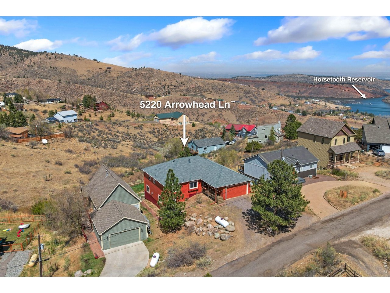 Wake up to views of Horsetooth Rock and step outside to one of Colorado's most beloved outdoor playgrounds. Tucked in Horsetooth Lake Estates - just across 38E from Horsetooth Mountain Park and minutes from the Reservoir - this home delivers a rare mountain retreat close to town. Southwestern vibes are woven throughout, from warm earth tones and rustic finishes to vaulted ceilings and a one-of-a-kind eat-in kitchen - creating a cozy, distinctive atmosphere that sets this home apart. Three bedrooms upstairs include a large primary suite with a full bathroom, walk-in closet, and deck with those signature Horsetooth Rock views. Downstairs offers a large family room/flex space with a gas fireplace, LVP flooring, and a 3/4 bath. The walkout basement offers direct access to the fenced, irrigated backyard. The flagstone patio creates a genuine outdoor retreat. The HOA handles road resurfacing and snow-plowing, and the dark mountain skies make for incredible stargazing. Hiking, biking, boating, climbing - it's all right here. This is the outdoor lifestyle you've been looking for, with the updates already done. The sellers have invested heavily: new roof in 2024, central A/C, all-new LED lighting, fresh interior paint, new carpet and luxury vinyl, 220V electrical upgrade, EV charger in the attached 2-car garage, and a radon mitigation system. All appliances are less than two years old. Pre-inspected.