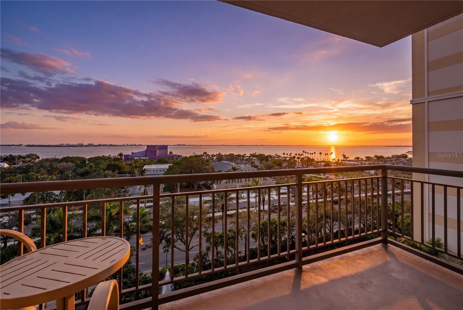 Immerse yourself in the vibrant energy of Sarasota’s coveted Rosemary District, where an inspired coastal lifestyle unfolds just beyond your doorstep. Perfectly positioned, moments from The Bay Sarasota and The Quay Sarasota, this residence offers effortless access to the city’s most exciting transformation – lush bayfront greenspaces, scenic paths, a new pier and curated waterfront experiences, including free concerts, yoga and even a kayak launch. Right at your doorstep you will discover a dynamic collection of Rosemary District cafés, acclaimed restaurants, artisan bakeries and boutique shops, all contributing to a navigable, cultured and endlessly engaging lifestyle. From morning rituals to sunset dinners along the bay, this residence, set within Alinari at Rosemary Place, invites you to experience Sarasota at its finest. Framed by breathtaking true full waterfront views that stretch across Sarasota Bay and beyond, this beautifully redesigned two-bedroom, two-bath residence captures unobstructed westerly vistas from its highly desirable eighth-floor position in the south tower, where natural light pours in and sunset gazing becomes a daily ritual. The interiors have been thoughtfully reimagined with a clean, modern aesthetic, featuring wide plank luxury flooring, quartz surfaces, new modern fixtures and a cohesive move-in-ready design. The open layout enhances the connection to the water, while a rare walk-in laundry room and additional flex storage space add everyday convenience. The primary suite offers a serene retreat with a walk-in closet and a well-appointed, fully customized en-suite bath, while the second bedroom is equally versatile for guests or a home office – each space sharing in the residence’s captivating views. Alinari presents a refined residential experience with amenities beyond expectation. Enjoy the privacy of a third-floor Olympic-length pool and deck where recreation and relaxation can easily be found. The state-of-the-art fitness center, modern and fully upgraded theater, business center, guest suites, game room, gated entry garage, 24-hour concierge and on-site security are just a small sample of Alinari features and lifestyle. Unique to the property you will enjoy a beautifully landscaped 35,000 sq ft gated recreational space that is for the exclusive enjoyment of Alinari owners and their pets. With strong reserves, no current assessments and elevated construction in Flood Zone X, the building offers peace of mind and enduring value. Complete with two garage parking spaces and climate-controlled storage, this residence is a rare opportunity to enjoy downtown Sarasota living at the intersection of culture, convenience and sweeping waterfront beauty.