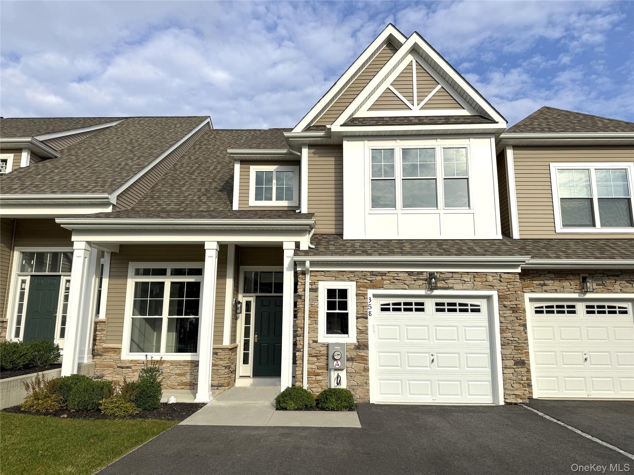 Discover this new construction townhome in the sought-after gated community of Country Pointe Meadows. Step through the covered entry and experience an open floor plan with exquisite finishes, top-of-the-line appliances, and exceptional attention to detail throughout.

The first-floor primary suite offers comfort and convenience with a spacious bedroom and a beautifully appointed bathroom. The main level also features a chef-inspired kitchen with an island, cozy breakfast nook, elegant dining area, family room with fireplace, laundry room, and a stylish half bath.

Upstairs, you’ll find a guest bedroom, full bath, and a versatile loft—ideal for a home office or relaxation space. Additional highlights include an unfinished attic, unfinished basement, and attached garage, offering plenty of storage and potential.

Enjoy resort-style living in this exclusive gated community, complete with a private clubhouse, two outdoor pools, tennis courts, fitness center, ballroom, and bar/lounge. Located minutes from shopping, dining, beaches, golf, and Long Island’s finest wineries.


*Some photos are virtually staged.