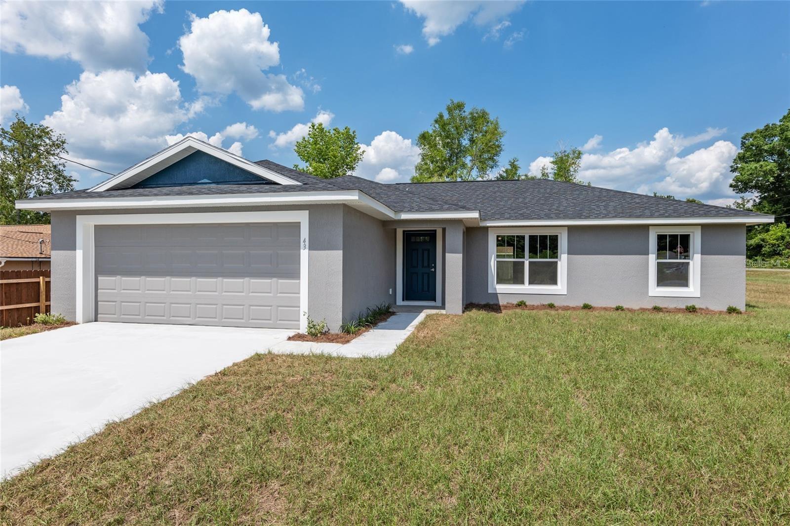 Under Construction. BRAND NEW home in Porter Shores (SE Ocala near Baseline)! Beautiful 3/2/2 home with OPEN FLOOR PLAN! NO CARPET ~ LVP throughout! Spacious living and dining room with vaulted ceilings. Kitchen has island/breakfast bar, pantry, SS appliances, and plenty of granite counters/soft close cabinets! Split bedroom plan. Primary suite has tray ceiling, large walk-in closet, and en suite with dual sinks, granite counters, linen closet, and walk in tile shower. Inside laundry room has an extra storage closet. Covered lanai overlooks a great backyard! Convenient location to shopping, dining, and parks! Pictures are of a model. Colors vary. Early June estimated completion date.