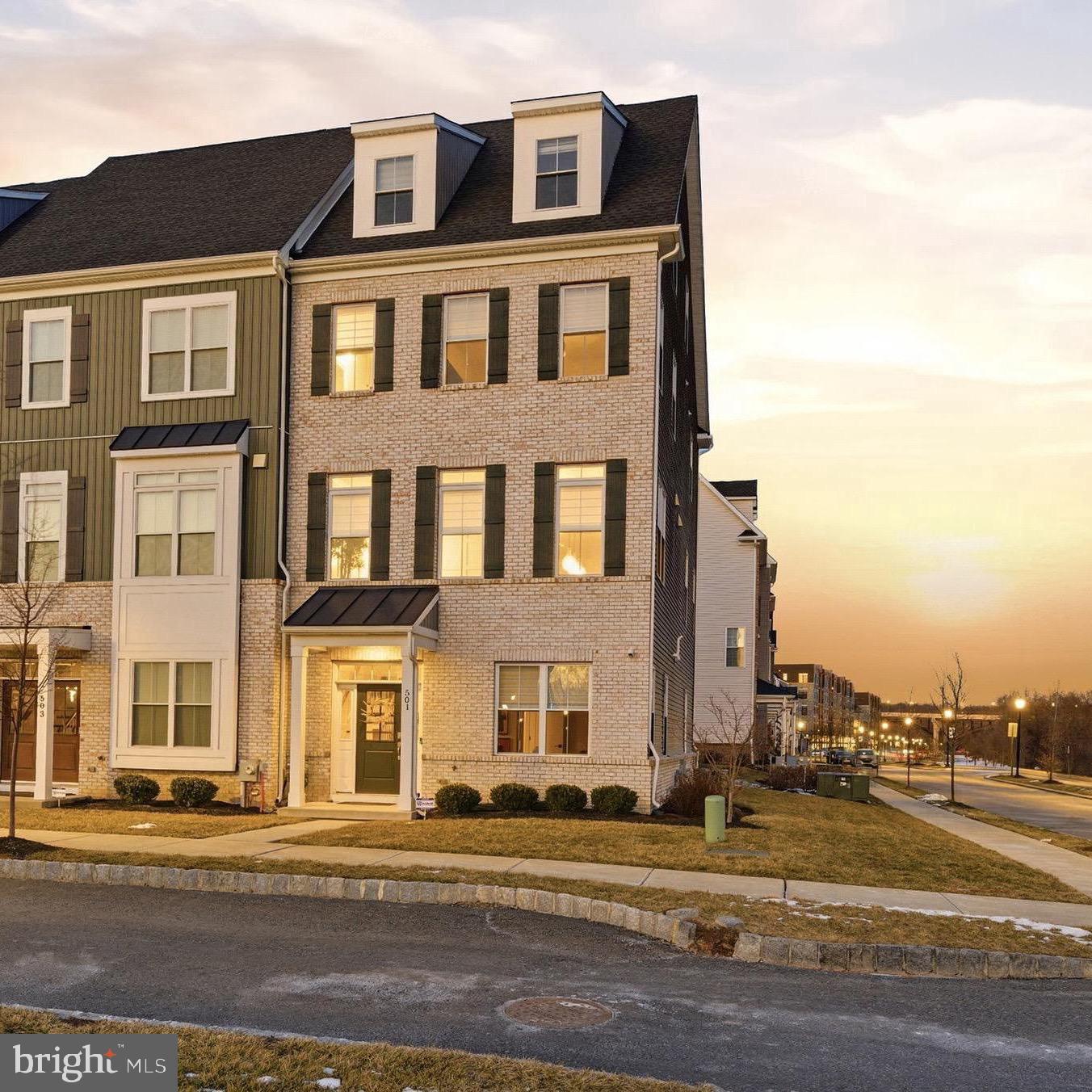 Luxurious 4- Level Townhouse in Phoenixville's SteelPointe Development available for first time since its new construction delivery in 2021. This prime location was the #1 property site chosen in pre-development. Corner lot, End Unit,  opposite open  spaces,  Park across front of house, convenient to Phoenixville access, this location has it all. Original Harrison Model, with many original builder/package upgrades along with  many tasteful personal upgrades added by current owner. Well over 100k has been put into this townhouse making it one of the finest in the development. This Harrison model floorpan was initially extended an extra 2' wider, making the entire townhome feel open and spacious.  8 extra windows were added to give this open floorpan a natural light filled feel.  Full brick veneer house front welcomes you to the front entrance.  Ground floor has a dedicated office ( possible extra bedroom), a half bathroom and a mudroom. Drive into your spacious double garage and access directly into the house from the ground floor also. The entire house has upgraded raised box panel molding along all stairway walls throughout the home. Premium hardwood floors and staircases throughout entire house.l  Up to the first floor finds an upgraded gourmet kitchen. Upgraded Kitchen Aid appliance package with Double Oven, under counter microwave, quartz counter tops , large kitchen  island. A separate Dining area on one side of the kitchen and a large family / Great room flows from the other side. TV room has had custom built ins added on either side of wall mounted TV.  This Light filled room also has a walkout to a nice sized composite deck. Upgraded custom lighting has also been added throughout.  Up to the 2nd floor finds a spacious primary bedroom suite with full bathroom and TWO  generously sized walk-in closets, ( another upgrade!),  Another two bedrooms and a full bathroom are also found on the 2nd floor. Stackable washer/dryer also on this floor.  Up to the 3rd floor will find a bonus room. A finished Living/TV room that has plenty of possibilities. Two additional dormers were added on this floor to   enhance the size and natural lighting. This  floor also extends out to another fantastic upgrade... a large roof top deck complete with a stone fireplace and hook up for outside TV.This truly is one of Phoenixville's best available Townhomes, all located in the highly desirable Phoenixville School District. Make sure to take the virtual Matterport tour for a in depth look through this house.Showings will begin Thursday feb 19th