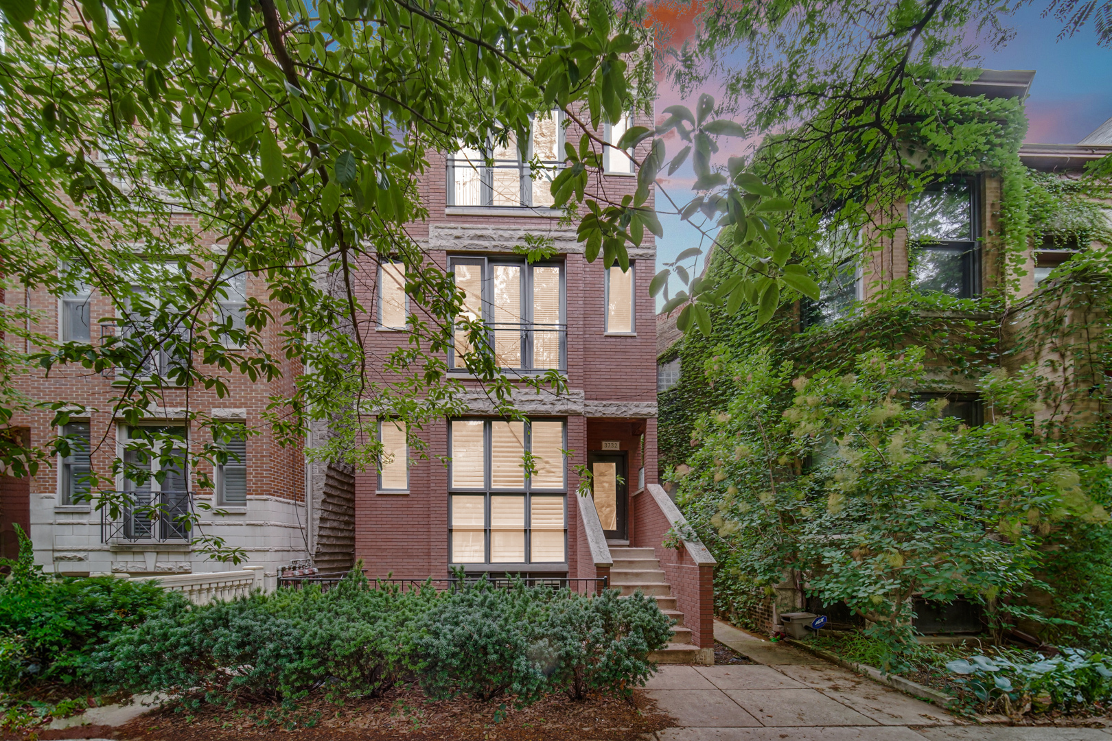 Incredible Wrigleyville Location - Just 150 Yards from Wrigley Field!  Welcome to this spacious and well-appointed 2-bedroom, 2-bathroom condo nestled on a charming tree-lined street in the heart of Chicago's iconic Wrigleyville neighborhood. This home offers the perfect blend of comfort, style, and unbeatable location.  Step inside to a bright and open-concept floor plan featuring a generous living area with a nook-ideal for a dining table or cozy breakfast spot. The eat-in kitchen offers ample counter space and cabinetry, perfect for entertaining or everyday living.  Both bedrooms are sizable with abundant closet space, including a walk-in closet in the primary suite. The primary bathroom features dual vanities, a jetted tub, and direct access to a large private deck-your personal retreat in the city.  Additional highlights include in-unit laundry, garage parking, and both private and shared outdoor space, including a common rooftop deck over the garage shared with just two other units.  Enjoy unbeatable proximity to Wrigley Field, Whole Foods, countless dining and nightlife options, the lakefront, Lake Shore Drive, and the Southport Corridor. This is city living at its best!