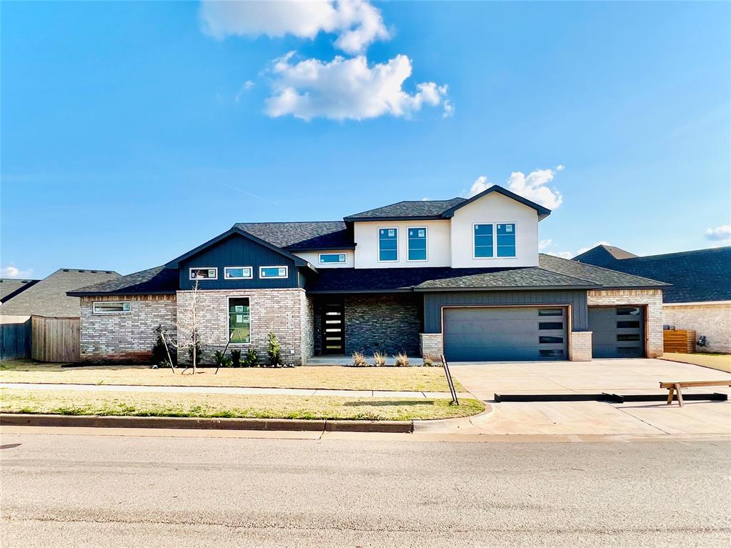 $10,000 Buyer’s Bonus – Spend It Your Way!
Plus, Builder-Paid Allowable Closing Costs and a Home Builder Warranty!

This stunning 2,567 sq. ft. new construction home in the desirable Rockwell Park community offers modern living in the highly rated Deer Creek School District. Located in Edmond, OK, you’ll enjoy convenient access to the John Kilpatrick Turnpike and Hefner Parkway—making commutes and weekend outings a breeze. The neighborhood features a community pool, green spaces, and a family-friendly park with a playground.

Step inside to a beautifully designed open-concept layout where the living room, dining area, and chef-inspired kitchen flow effortlessly together. The kitchen boasts a large pantry, a center island with storage on both sides, abundant counter space, and custom built-in cabinetry that blends beauty with practicality. A versatile pocket office provides the perfect space for a home office, study area, or future butler’s pantry.

The luxurious owner’s suite includes a spa-like bathroom with a soaking tub, dual vanities, and a large walk-in shower, as well as direct access to the laundry room through the master closet.

Upstairs, you’ll find three spacious bedrooms, a full bathroom, and convenient attic access. Additional highlights include a 3-car garage, a mudroom, and designer finishes throughout.

Move-in ready in just 3–4 weeks!
Don’t forget the $10,000 Buyer’s Bonus—use it toward upgrades, a rate buydown, or however you choose. Plus, enjoy builder-paid allowable closing costs and peace of mind with a home builder warranty.