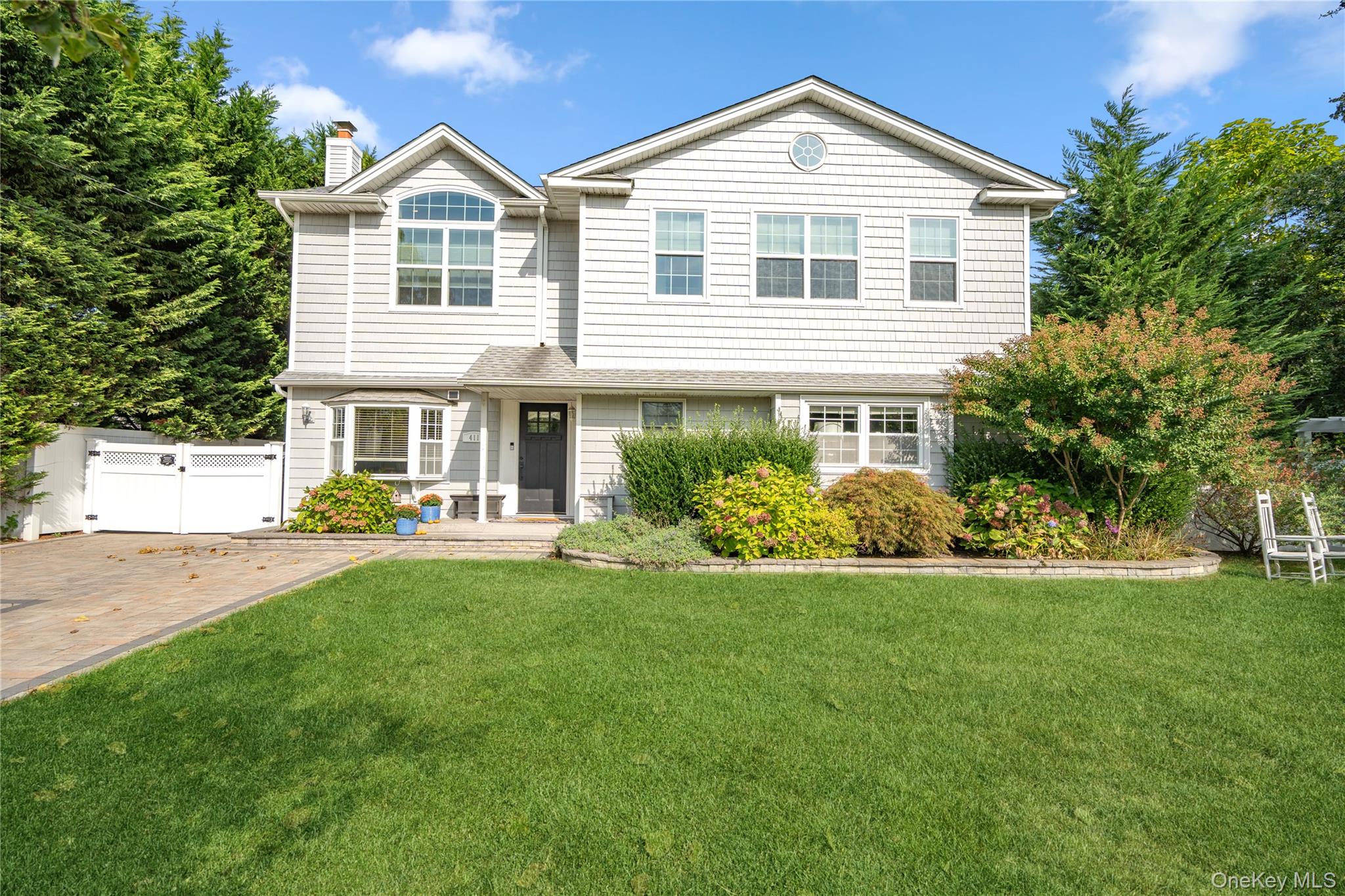 Updated Colonial Home with 1,932 Square Feet Plus a Detached 2-Car Garage with Gym Located South of Montauk Highway in the Babylon Beach Estates Subdivision with Associated Docking, Use of the Beach on the Great South Bay at the End of West Bay Drive and Clubhouse for Activities. See www.WestIslipBeach.com for Full Information and Optional Membership. Enter into a Large Dining Room/Eat-in-Kitchen with Stainless Steel Appliances Which Leads Out to an Enclosed Porch and Out to the Backyard. Laundry Room/Pantry Closet with Barn Sliding Door, Built-In Cabinetry and Wine Refrigerator. Great Room with Gas Fireplace, Crown Molding, Ceiling Fan with Light, and Sliding Door to Backyard. Half Bath and Storage Closet with Instant Hot Water Heater Off of Great Room. 2nd Floor Features a Master Bedroom with Cathedral Ceiling, Door to Balcony Overlooking Backyard, Walk-In-Closet and Master Bath with Shower. 2nd Bedroom with Walk-In Closet & Ceiling Fan with Light. 3rd Bedroom with Double Closet & Ceiling Fan with Light. Double Linen Closet. Full Hall Bath with Tub. Pull Down-Stairs to Attic Storage. Oak Floors Throughout. Private 90' x 105' Fenced Parcel with 15' x 27' Vinyl Inground Pool, Paver Patio and Outdoor Kitchen with Gas Grill. Detached 2-Car Garage Features 1 Garage with EE Opener for Car and a 2nd Garage Fully Insulated with Heat, CAC, LED Hi Hats & 2nd Storage for Gym and Storage. Two Separate Gas Hot Air Heating Systems and Central Air Conditioning. 4-Foot Crawl Space. Inground Sprinklers. VIRTUAL TOUR: https://sites.allmediatours.com/listing-preview/211608871