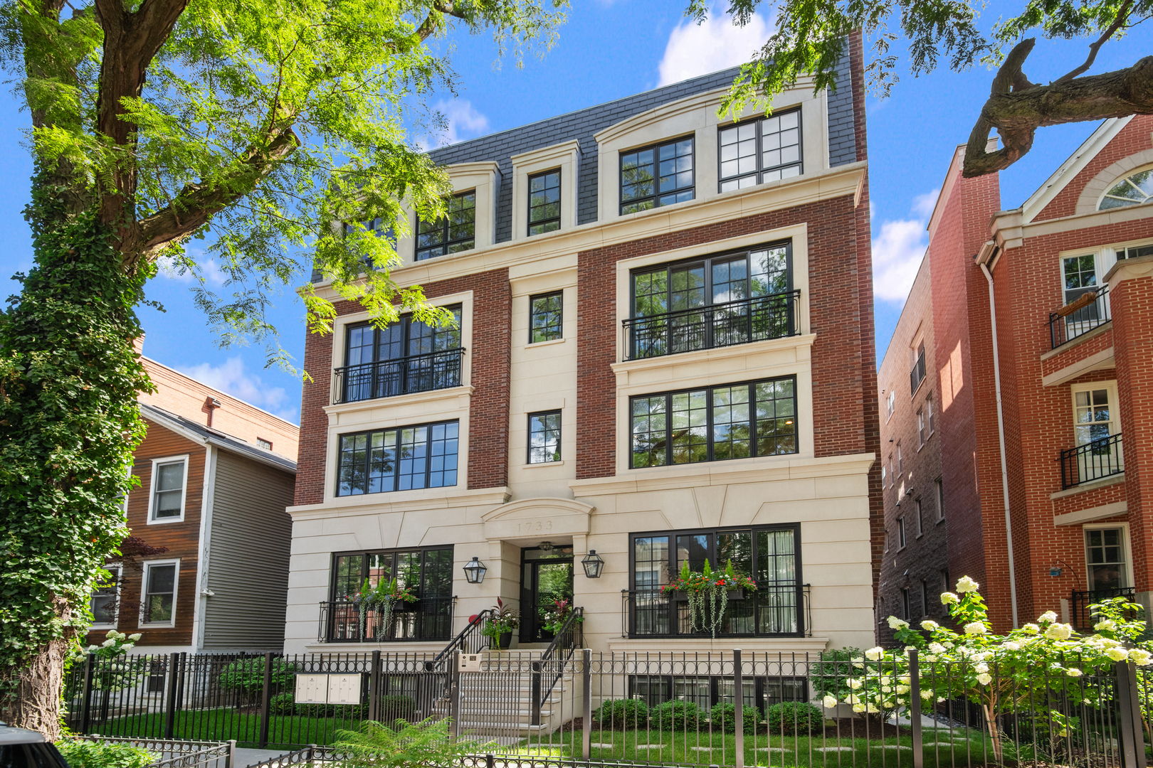 Better than new construction, this impeccably designed 3-bedroom, 3.1-bathroom penthouse condo featuring a massive rooftop deck in the heart of Lincoln Park is the epitome of urban luxury living. This 5 unit, all brick and limestone building developed by Swan Properties boasts impeccable craftsmanship and upscale design at every turn. As you step inside, you are captivated by the high ceilings, abundance of natural light, and luxury finishes throughout including oak hardwood floors, crown molding, designer lighting, custom window treatments, and much more. At the heart of the home is the chef's kitchen featuring custom cabinetry, massive quartz island, designer backsplash, top-of-the-line Sub-Zero appliances and butler's pantry. Adjacent to the kitchen is the spacious living room which features a gas fireplace flanked by built-in bookshelves, stone mantle, and built-in banquette dining table. Living room opens to a large balcony complete with gas and electric; perfect for entertaining. The front of the main level offers the family room and formal dining area complete with an additional gas fireplace, wet bar with beverage fridge, and juliet balcony with west facing views allowing light to flood the entire space. Powder room and additional storage complete this level. The second level offers 3 generously sized bedrooms and three full baths. Primary bedroom features a private balcony, 2 large outfitted walk-in closets and luxurious spa like bathroom including dual vanities, steam shower, radiant heated floors, and a soaking tub. This floor also offers a dedicated laundry room with side-by-side washer/dryer, sink, and plenty of cabinets that provides both convenience and organization. The home's pinnacle feature is the expansive private rooftop complete with self irrigation planters, speakers, and incredible unobstructed views of downtown Chicago. This is the perfect space for entertaining or for quiet relaxation. Additional highlights include 1 garage parking space, additional storage, and professionally landscaped entry. Experience everything this incredible home has to offer, just steps from the best of Lincoln Park - award-winning restaurants, top-rated schools, charming shops, scenic parks, convenient public transit, and so much more!