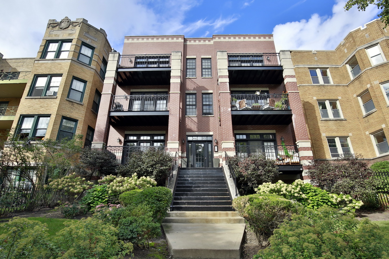 Welcome to the luxurious, bright and spacious 3-bedroom, 2-bathroom condo nestled on one of Uptown's most picturesque, tree-lined streets. This beautifully maintained home offers the perfect blend of vintage charm and modern updates, featuring high ceilings, large windows that flood the space with natural light throughout the day.  The open-concept living and dining area is ideal for both relaxing and entertaining, while the updated chef kitchen offers granite breakfast bar, ample cabinet space and room for culinary creativity. All three bedrooms are generously sized, with the primary suite boasting an en-suite bath for added privacy.    Additional highlights include: a dedicated garage parking space, brand new HVAC system (2025), hardwood floors throughout, wood burning gas fireplace, natural stone baths, in-unit laundry, private  balcony, large private storage unit.    You'll love the unbeatable location - just a short walk to the shops and restaurants of vibrant Clark Street, the Ravenswood Metra, and both the Red and Brown Line L stops. Enjoy a true neighborhood feel while staying close to everything the city has to offer.    Don't miss this opportunity to own a piece of classic Chicago charm with all the modern conveniences!