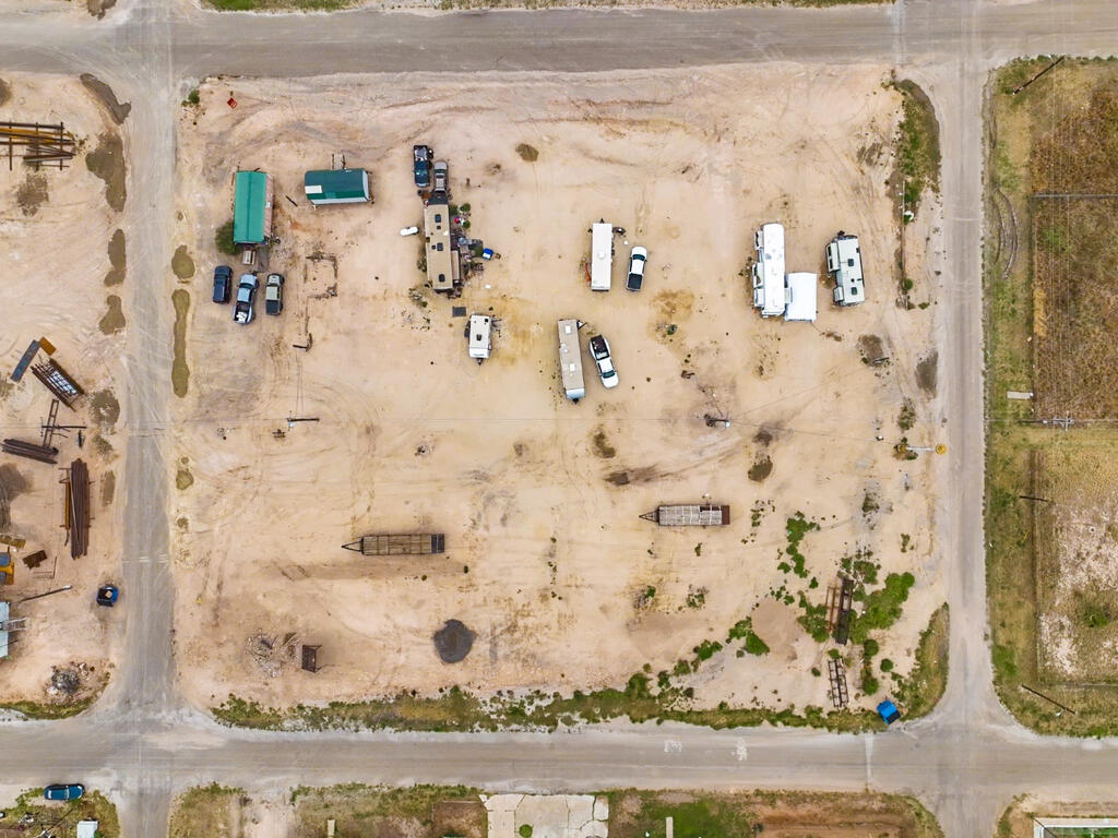 This RV Park has 24 full hook-up spots, sitting on 1.378 acre block in Goldsmith. There is electricity, water and sewer to the property. Plus, a 1 bedroom 1 bathroom efficiency cabin located on the property that rents for $800 a month. A laundry house with washers and dryers for tenants. The RV spots rent for $400-500 a month. Located 20 miles northwest of Odessa....run it as an RV park, house your own workers, or hold the land; it is platted as 24 lots. Call today for a showing!