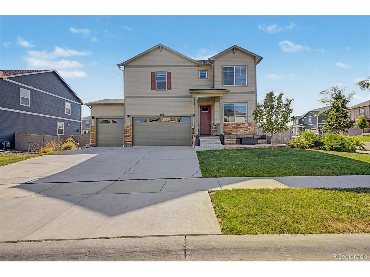 This is a rare opportunity in Vantage: a home offering both a 3-car garage and a finished basement, a combination most homes here don't have. The nearly 700-square-foot finished basement features 9-foot ceilings and a flexible layout, ready for a media room, play space, or hobby studio, plus a bedroom that works as a remote office or guest suite with easy access to a full bathroom, while roughly 300 square feet of unfinished space provides ample storage. This lower level was permitted and passed inspections through the Town of Berthoud. The 3-car garage matches that thoughtfulness, with tall ceilings, extra depth for storage, and two 220-volt outlets ready for EV charging or shop tools. Outside, every exterior update was approved through the architecture design process, starting with a flagstone front patio connected by a concrete sidewalk to a covered back patio and additional concrete patio for seating and grilling. Seven professionally planted trees, each over 7 feet tall, provide real privacy and shade, while a flat grass area just steps away offers room for play alongside a garden currently growing pumpkins for fall harvest. The corner lot opens to mountain views and Colorado sunsets, best enjoyed from the patio or hot tub, and ample side parking means your boat, camper, or trailer can pull right up. Inside, the home offers a tankless water heater, active radon mitigation, window blinds throughout, and smart home technology with remote access, alongside the kitchen island, gas fireplace, and main-level office. Vantage residents enjoy TPC Colorado privileges with dining access, a fitness center, a resort-style pool and hot tub, and access to Lonetree Reservoir, plus a private neighborhood pool with splash pad, playgrounds, and two dog parks. Surrounded by scenic water and mountain views in one of Berthoud's newest neighborhoods, this home offers a rare mix of finished basement, oversized garage, and upgraded outdoor living hard to find elsewhere in Vantage.