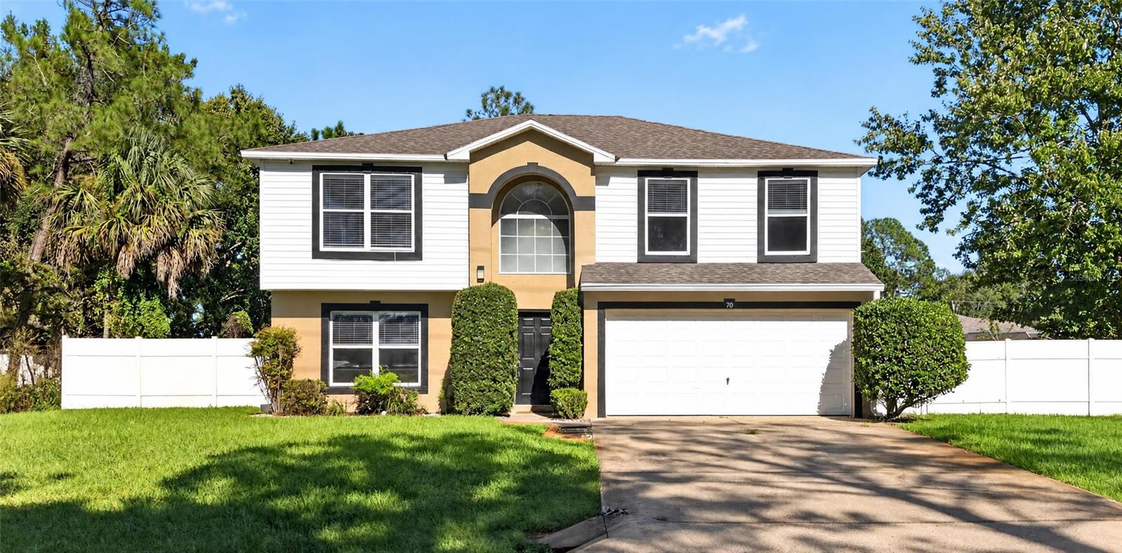 DOUBLE LOT, FULLY FENCED, PRIVATE SALTWATER HEATED POOL & SPA. This rare Indian Trails property offers the kind of space, privacy, and lifestyle features that are almost impossible to find in Palm Coast. Sitting on an oversized double lot, the moment you walk through the front door you’re greeted with beautiful natural light and a stunning view of the large, heated saltwater pool and spa. The outdoor living area is exceptional, featuring an oversized screened-in lanai, upgraded paver patio, and a spacious covered section perfect for grilling, dining, and entertaining. The fully fenced yard provides incredible room to spread out, relax, and enjoy true Florida living.Inside, the home feels warm and inviting with new LVP flooring downstairs and a cozy living area that flows seamlessly into a kitchen overlooking the pool and lanai. Upstairs you’ll find three bedrooms along with a generous loft space that can easily function as a playroom, office, or flexible multi-use room. The primary suite includes custom built-in cabinetry and a large walk-in closet for excellent storage.One of the most impressive features of this property is the 1,000 sq ft detached garage/workshop, built in 2017, complete with running electrical, plumbing, and its own private driveway and gated entrance. It’s perfect for a workshop, business, hobby space, or storage for toys, and could even be transformed into an in-law suite, game room, or man cave.This home is clean, well-maintained, and move-in ready, offering a rare combination of land, storage, privacy, and lifestyle amenities. Homes like this don’t come around often.Upgrades include new roof in 2021, HVAC 2016, detached garage built in 2017, saltwater pool and spa built in 2016, gas pool heater 2016, new LVP flooring downstairs, upgraded paver patio, shutters, gutters, pull-down screen on garage door, stainless steel appliances, pool bath, fully fenced double lot, oversized screened-in lanai, custom built-ins in the primary suite, and private gated access to the detached garage.