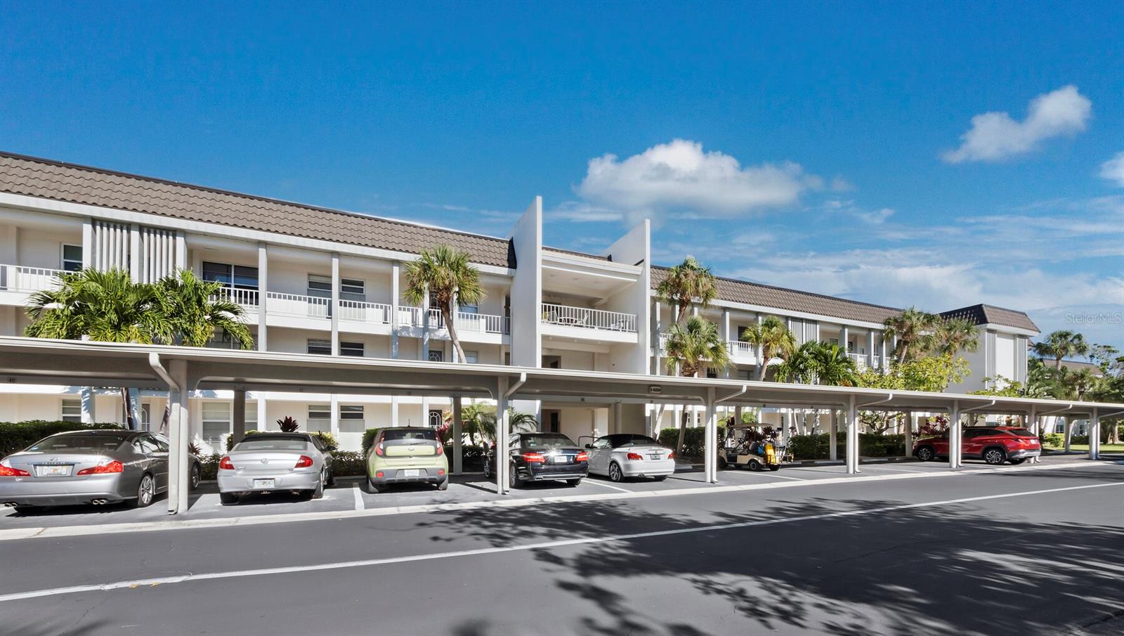 Exceptional Value on Longboat Key! Seller has found her new home and is offering this beautifully updated, move-in-ready, turnkey-furnished condo priced below market value! Enjoy a desirable open floor plan with the enclosed lanai incorporated into the living area, creating extra living space and showcasing lovely boat basin views. Updates include luxury waterproof flooring, fresh paint, popcorn ceiling removal, an updated kitchen with granite countertops, beautifully updated bathrooms, newer A/C, new water heater and range. New hurricane-impact windows and sliders are in process, and the community features a new roof.Longboat Harbour is a well-managed, non-age-restricted, boater-friendly community with full-time staff and resort-style amenities: four heated pools, fitness center, sauna, tennis and pickleball, plus private gated and deeded beach access with private parking, indoor showers, restrooms, picnic areas and beach chair storage. Boat dock space is available for an additional fee, subject to availability. Includes deeded covered parking.Enjoy the best of Gulf-to-Bay living—boating, beaches and resort-style amenities at an outstanding value! Ideal for year-round living, a vacation retreat or investment opportunity.