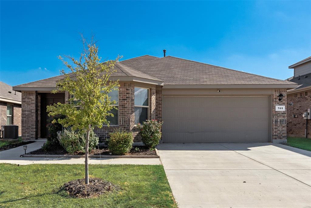 Welcome home to this charming 3-bedroom, 2-bath home in the popular Liberty Trails community of Justin! Designed for easy living and entertaining, the bright, open floor plan seamlessly connects the spacious family room, dining area, and kitchen. The kitchen is the heart of the home, featuring granite countertops, abundant cabinetry and counter space, a large pantry, and an expansive island where friends and family can gather while you cook. The private primary suite provides a relaxing retreat with a generous walk-in closet and ensuite bath. Outside, enjoy a large backyard and covered patio with plenty of space for entertaining, playing, or simply unwinding. Liberty Trails offers wonderful neighborhood amenities including a community pool, playground, scenic pond, and walking trails. Located in acclaimed Northwest ISD and just 6 miles west of Texas Motor Speedway and Tanger Outlets, you'll enjoy convenient access to shopping, dining, entertainment, medical facilities, schools, and more. A great combination of space, location, and community amenities!