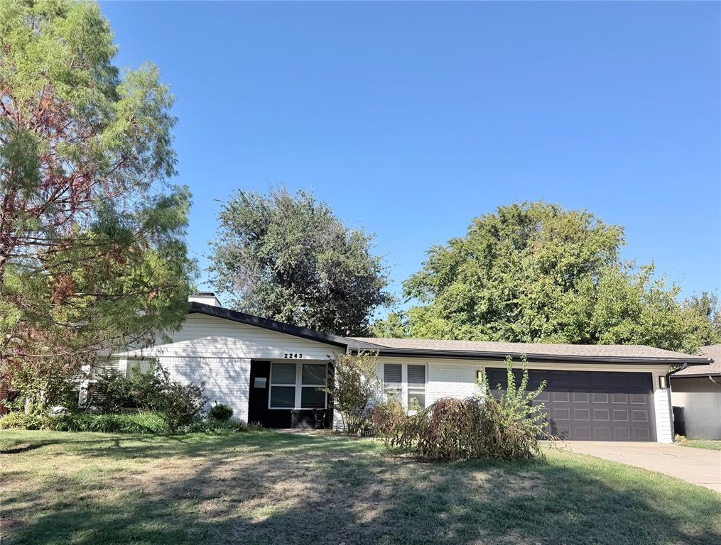 Beautifully remodeled just two years ago, 2243 NW 55th Street offers fresh finishes and convenient Oklahoma City living! Enjoy a completely updated kitchen and bathrooms, new flooring throughout, fully replaced hot and cold water supply lines, and a brand-new water heater. Located in a quiet, established neighborhood, this home puts you close to schools, shopping at Penn Square Mall and the new OAK development, along with a variety of restaurants. Quick highway access makes getting around the metro easy. A welcoming place to call home with thoughtful updates throughout!