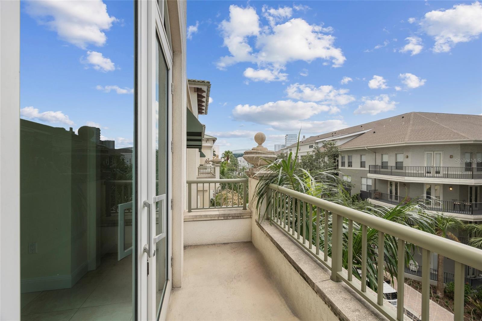 Under contract-accepting backup offers. - PRICE IMPROVEMENT - Step into refined city living with Unit 407 at The Plaza on Harbour Island, a rare Casita residence offering the comfort of a private home with all the benefits of resort-style condominium living. Unlike traditional tower units, this residence is tucked on the exclusive amenities level, giving you direct access to The Plaza’s world-class offerings while providing a sense of privacy and ease. The heart of this Casita is its expansive private patio—a true extension of your living space where you can enjoy morning coffee surrounded by lush landscaping, host intimate dinners under the stars, or unwind in your own quiet outdoor retreat.

Inside, you’ll find an open and thoughtfully designed layout, filled with warm natural tones, elegant finishes, and generous living areas that seamlessly connect indoor comfort with outdoor charm. The residence is perfectly suited for those who value convenience without sacrificing style. With its unique floorplan and private access, this home offers a lifestyle that feels both connected and tucked away—a rare combination in the heart of the city.

Living at The Plaza means enjoying unparalleled amenities: a 24-hour concierge and valet service to simplify your day, a resort-style pool and spa for moments of relaxation, a state-of-the-art fitness center, and beautifully designed social and business spaces ideal for entertaining or working from home. Beyond the building, the vibrant Harbour Island community is at your doorstep. Stroll the Tampa Riverwalk, catch a game or concert at Amalie Arena, enjoy dinner at some of Tampa’s most celebrated restaurants, or explore the shops and cafés of Water Street—all.

Unit 407 is more than a home; it’s a lifestyle experience. With its private Casita-style design, direct access to amenities, and unbeatable Harbour Island location, this residence offers a rare opportunity to live, work, and play in one of Tampa’s most desirable addresses. Whether you’re seeking a serene retreat, a place to entertain, or a stylish city residence, this Casita delivers it all.