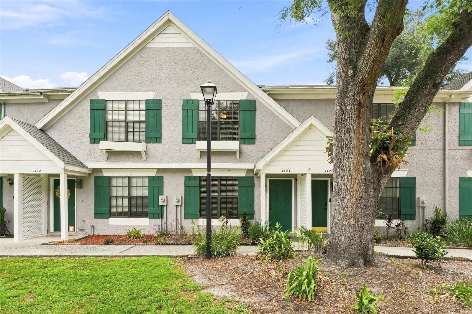 Virtually Staged. A townhouse with all the updates PLUS your own YARD! Yes, please! Welcome to this 2 bedroom, 2.5 bathroom in Sheffield Woods located in Brandon, FL. A newer A/C, water heater, updated kitchen and bathrooms make this the perfect choice at an affordable price. Upon entering, you'll find the kitchen features granite countertops, a perfect coffee bar spot, & pantry. Downstairs features wood-look tile throughout with an updated 1/2 bath. A cute reading nook/pet house is under the stairs! Outside there is a covered, screened-in patio and private fenced in yard. The laundry is located in an exterior closet with hook ups also available upstairs in the interior. Upstairs you will find 2 bedrooms and 2 bathrooms with plenty of closet space. The roof was replaced in 2017 and A/C in 2025, Water Heater 2026. The location makes everyday life convenient, with shopping, dining, recreation, and major roadways all within easy reach! Less than 2 minutes to the restaurants, shops, & Publix at Winthrop Village and less than 2.5 mi to Target!