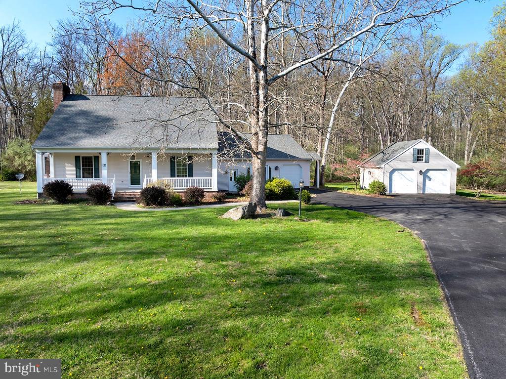 Location, Location, Location!95 Roundtop Lane in beautiful Gettysburg poses a rare opportunity to own a private home nestled against the Gettysburg National Military Park. With approximately 373 feet bordering this expansive historic landscape, you’ll enjoy unmatched serenity, natural wildlife, and protected surroundings.Perfectly positioned in this tastefully developed community, this property offers the perfect balance of privacy and convenience. Set back from the road and surrounded by mature trees, the home feels secluded—especially when the foliage is in full bloom, making neighboring homes barely visible.Inside, the home features:               4 bedrooms, including one conveniently located on the main floor               3 full bathrooms               A second-floor laundry for added ease               Both a formal living room and a comfortable family room               A cozy, inviting kitchen perfect for everyday cookingAdditional highlights include a one-car attached garage and a separate two-car detached garage—ideal for extra vehicles, hobbies, or storage. A charming three-season room offers endless possibilities for customization, whether you envision a sunroom, reading nook, or entertaining space.If you’re looking to step away from the hustle of city life—without being too far from modern conveniences—this property delivers the best of both worlds.Come experience the peace, privacy, and history that make this home truly one of a kind.