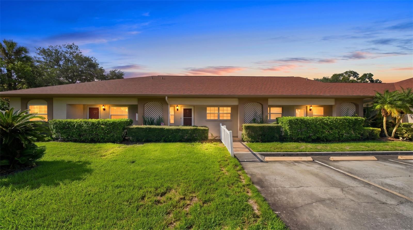 This beautifully updated 2-bedroom, 2-bathroom first-floor condo at Azalea Woods in the heart of Clearwater's coveted Countryside area offers the perfect blend of comfort, style, and unbeatable location.Step inside and you'll immediately notice the clean, bright tile flooring throughout, giving the home a fresh and modern feel that's easy to maintain in Florida's climate. The kitchen has been fully renovated- truly move-in ready. Both bathrooms have been thoughtfully updated, offering a polished, refreshed look.A new electrical panel (2020), 2016 A/C unit, tankless hot water heater, and a water softener mean you can move in with confidence and peace of mind. The hurricane window tint adds an extra layer of protection and energy efficiency, keeping your home cooler and your insurance costs in check.One of this unit's most unique features is the enclosed patio space- a true bonus room ideal for relaxing, extra storage, or a laundry area complete with washer and dryer hookups. And the location of this unit within the community is simply unbeatable. You step right off your patio and you're directly poolside. No stairs, no elevator, no long walks, just instant resort-style living steps from your door.The Azalea Woods community is well-maintained and offers a community pool and cabana, covered carport parking, car wash area, and meticulously kept landscaping throughout. Small pets are welcome for owners. The community is conveniently located minutes from Westfield Countryside Mall, top-rated dining, excellent medical facilities, downtown Dunedin, Safety Harbor, and the world-famous Gulf beaches including Honeymoon Island and Clearwater Beach.