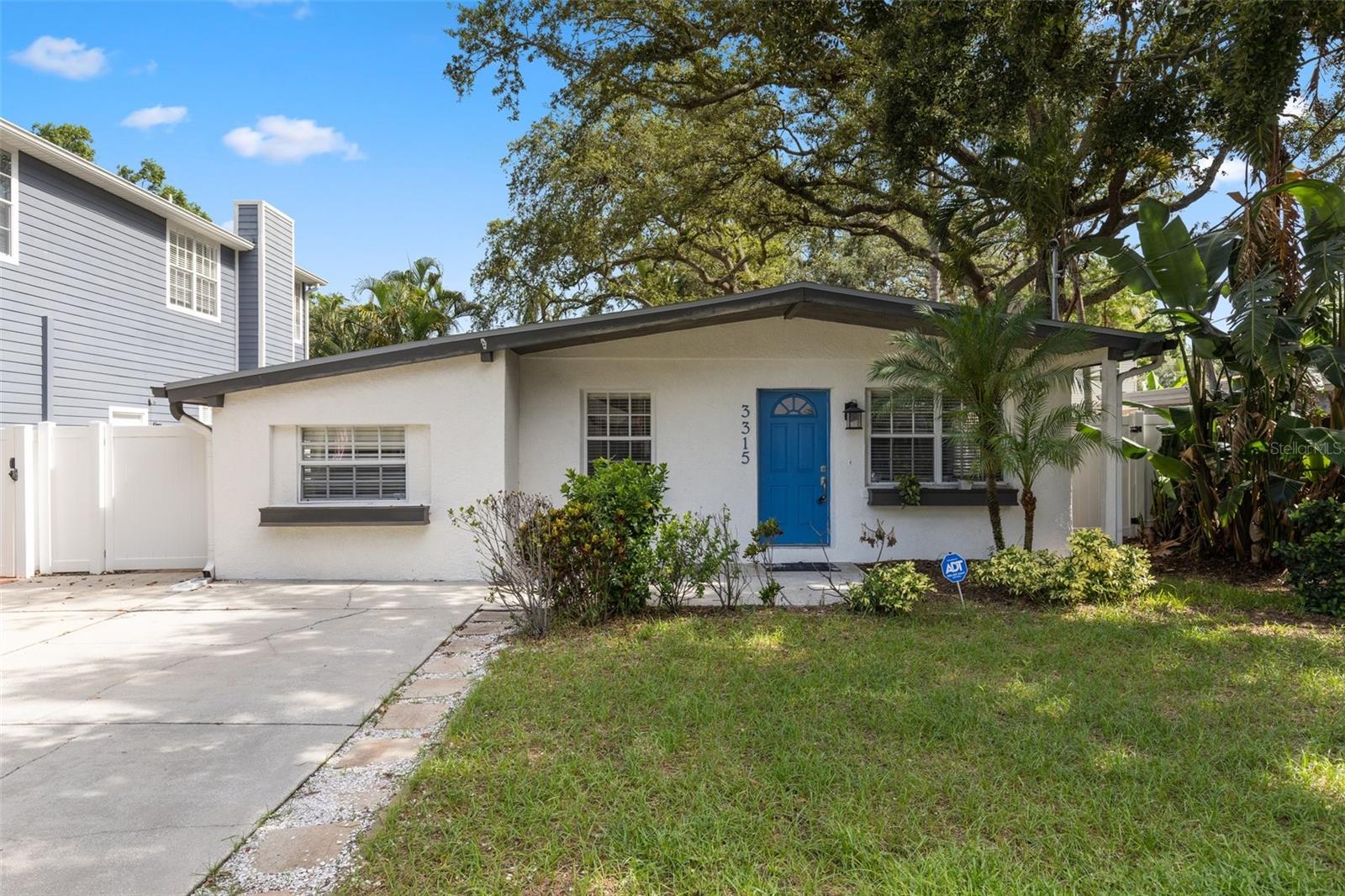 One or more photo(s) have been virtually staged.  Charming and well maintained South Tampa home just north of Gandy and walking distance to Bayshore Boulevard.  This gem features an open floor plan with 1511 sq ft of living space, 3 spacious bedrooms, 2 bathrooms, and a versatile office/den room.  Hardwood floors can be found throughout the living areas.  The open kitchen is complete with granite countertops, stainless steel appliances, 40 inch custom cabinetry and breakfast bar overlooking the cosy family room. In addition, the kitchen has a comfy breakfast nook with a window overlooking the front yard. Primary suite features walk in closet,  updated bathroom with dual sinks, glass walk in shower, private water closet, and a linen closet.  Two secondary bedrooms, one with dual closets and hardwood floors and  the other with a walk in closet and carpet. Secondary bathroom with shower/tub combo has also been recently updated.  There is even a very spacious indoor laundry room with washer and dryer.  The laundry room has a door leading you to outdoor living at its finest with a screened and covered patio, outdoor brick paved area and shaded backyard with a privacy vinyl fence.  This gem has been well maintained, is move in ready and just waiting for you to call it home.